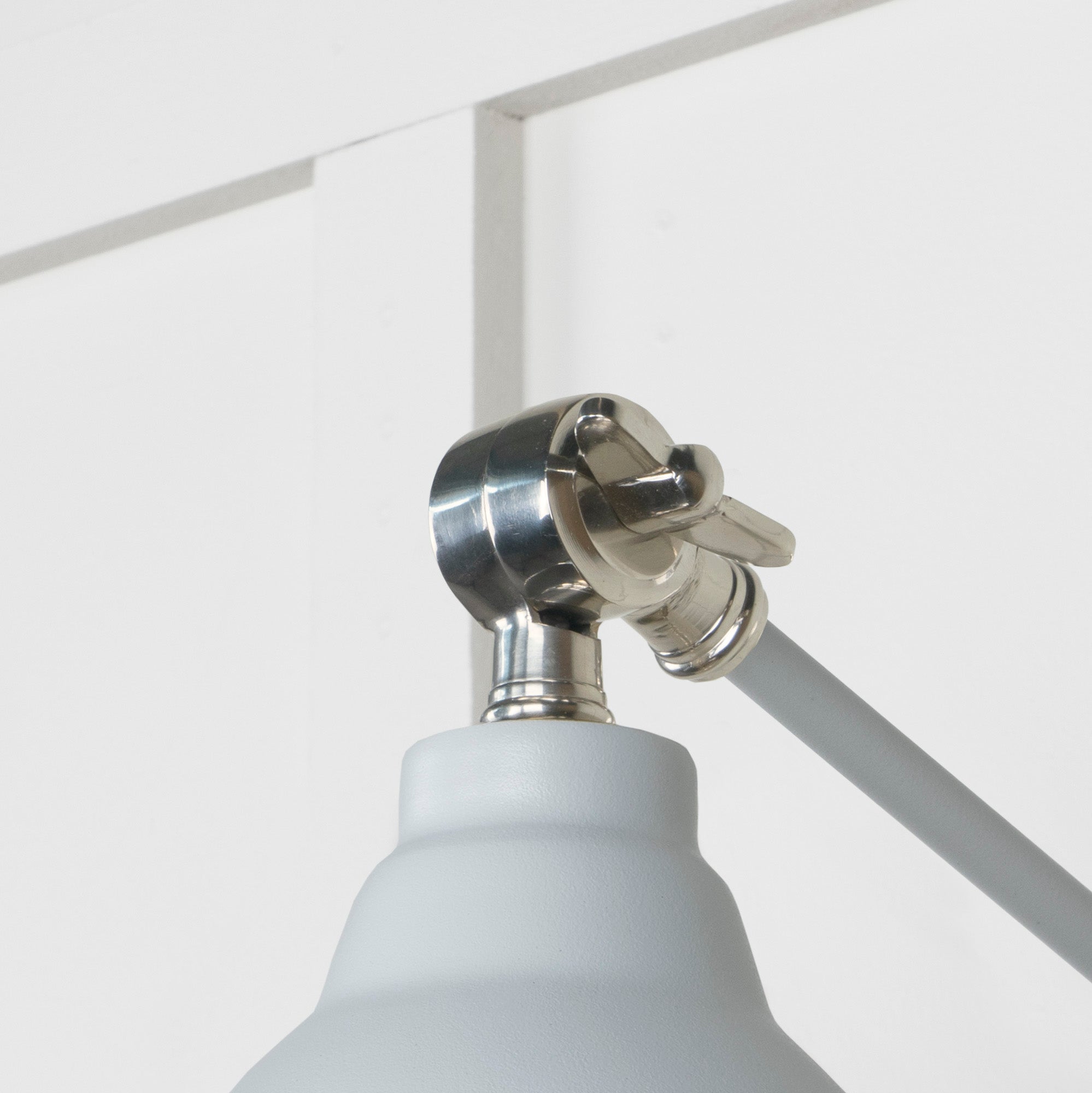 Smooth Nickel Brindley Wall Light Birch, Detailed close up view of pendant.