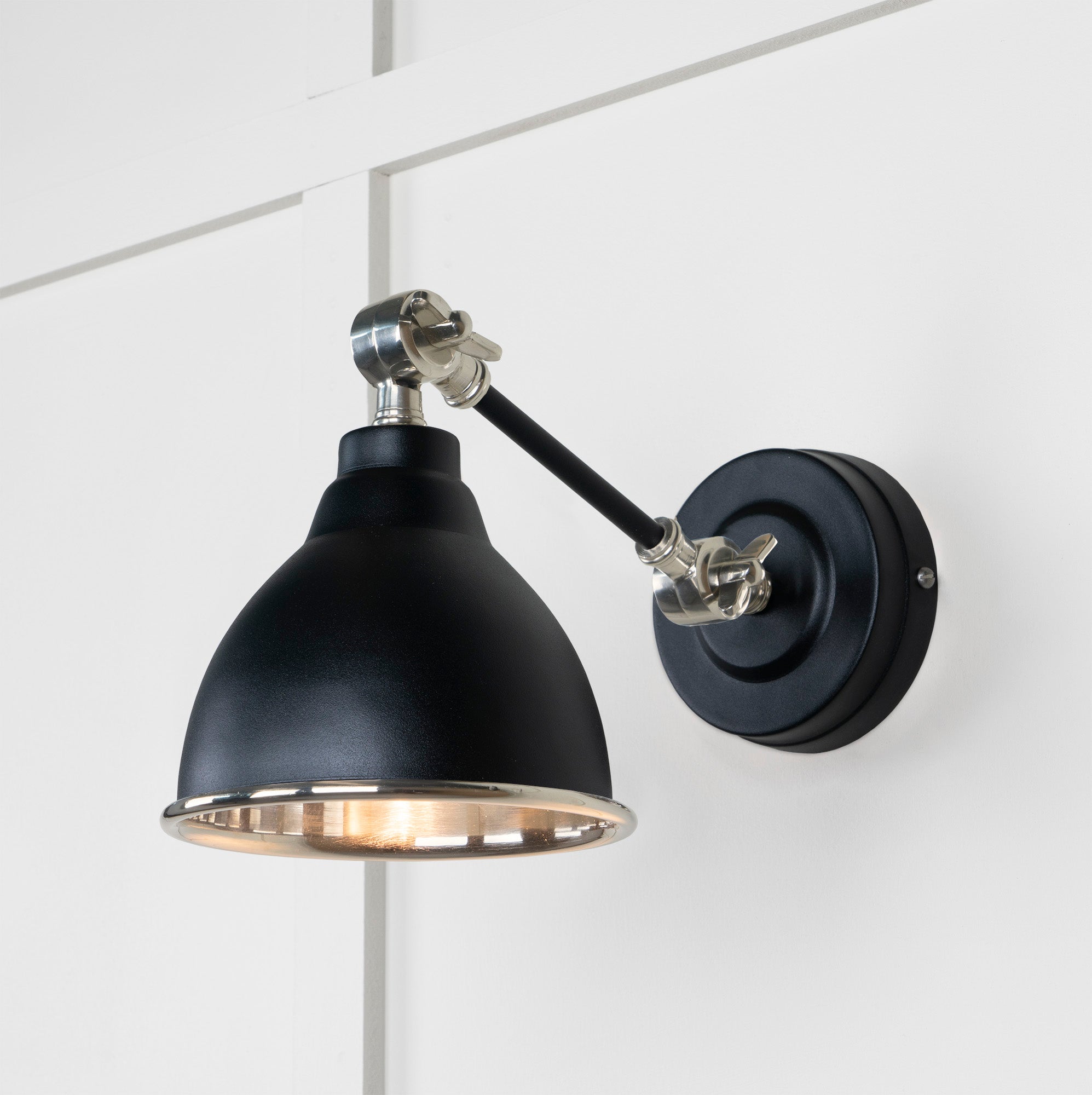 Smooth Nickel Brindley Wall Light Elan Black, Front Side with light on.