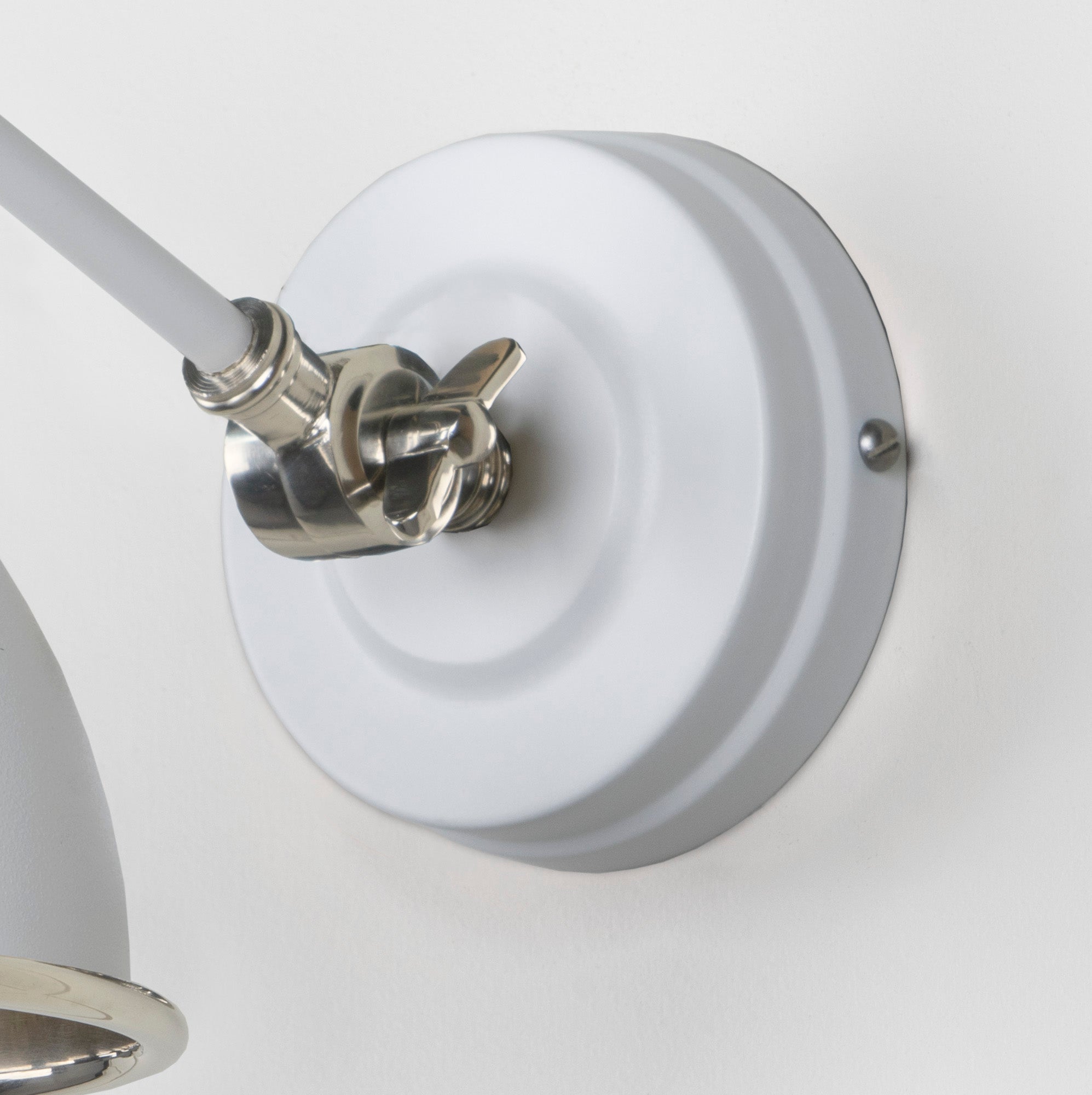 Smooth Nickel Brindley Wall Light Flock, close up view of fitting and cable.