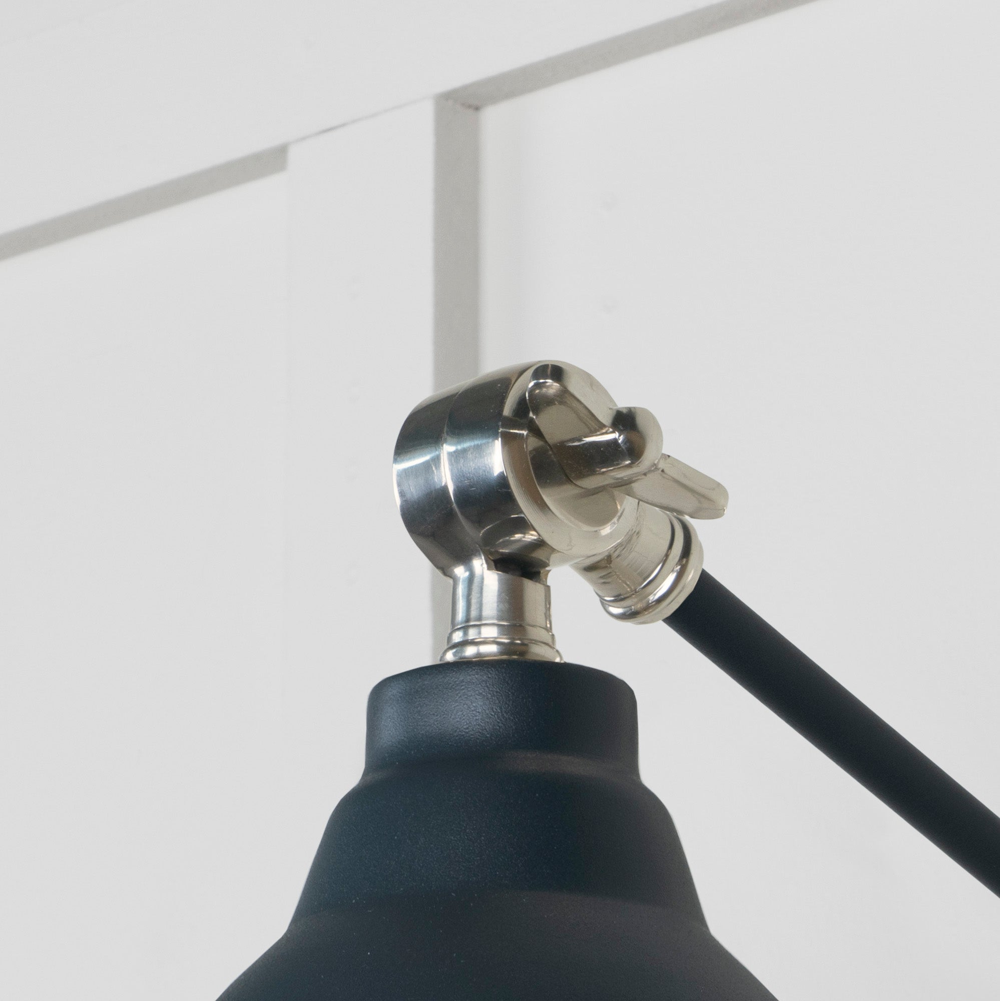 Smooth Nickel Brindley Wall Light Soot, Detailed close up view of pendant.