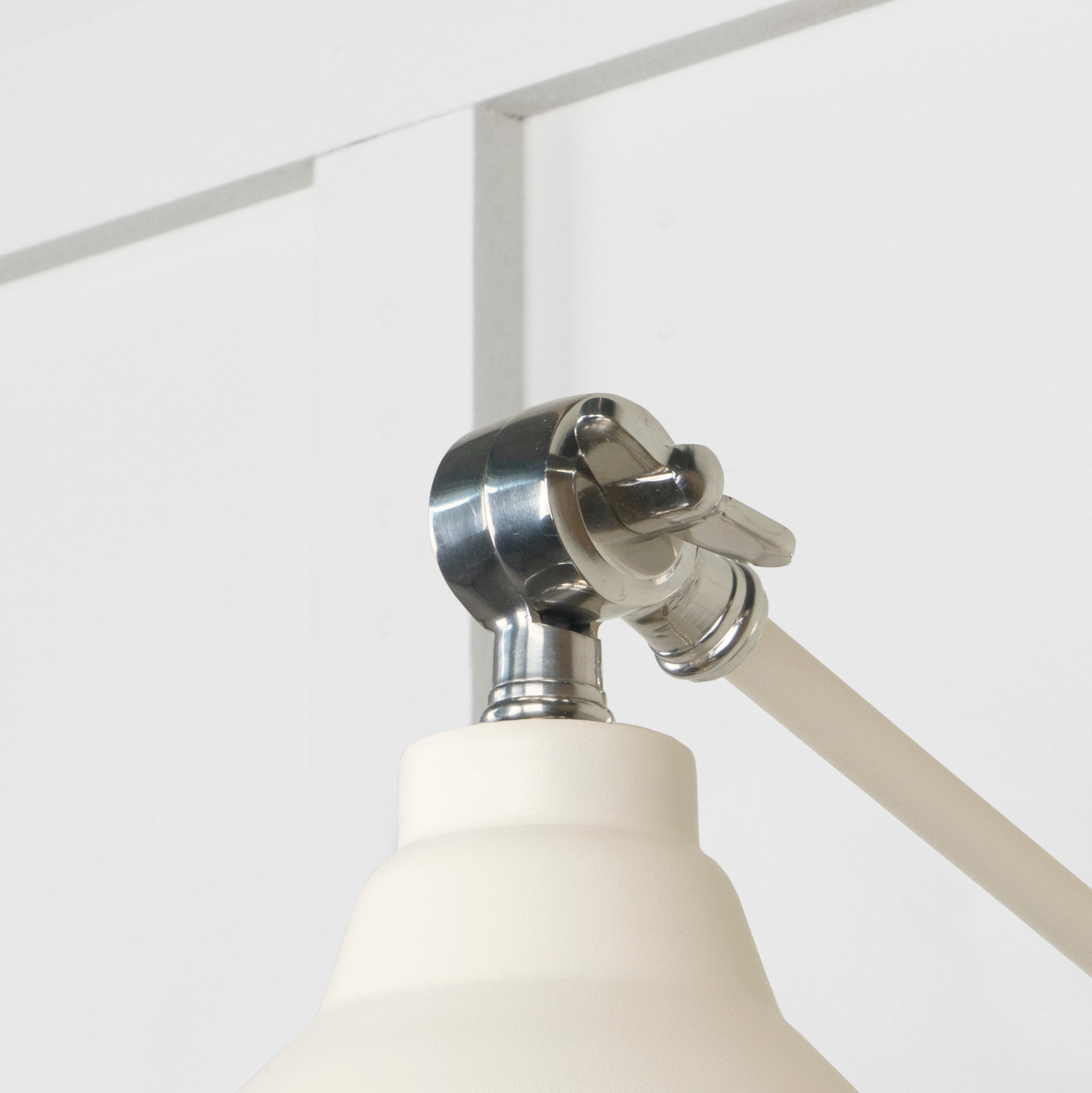 Smooth Nickel Brindley Wall Light Teasel, Detailed close up view of pendant.