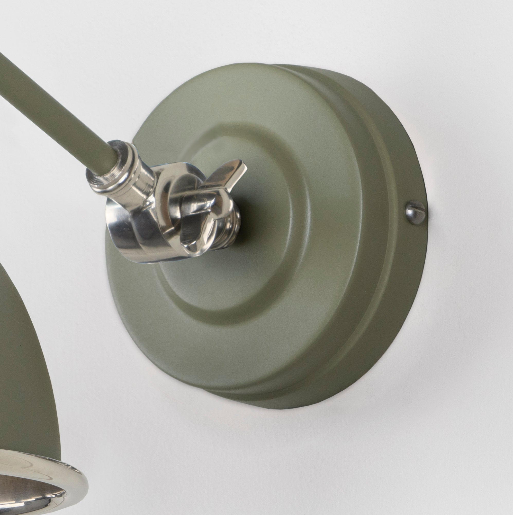 Smooth Nickel Brindley Wall Light Tump, close up view of fitting and cable.