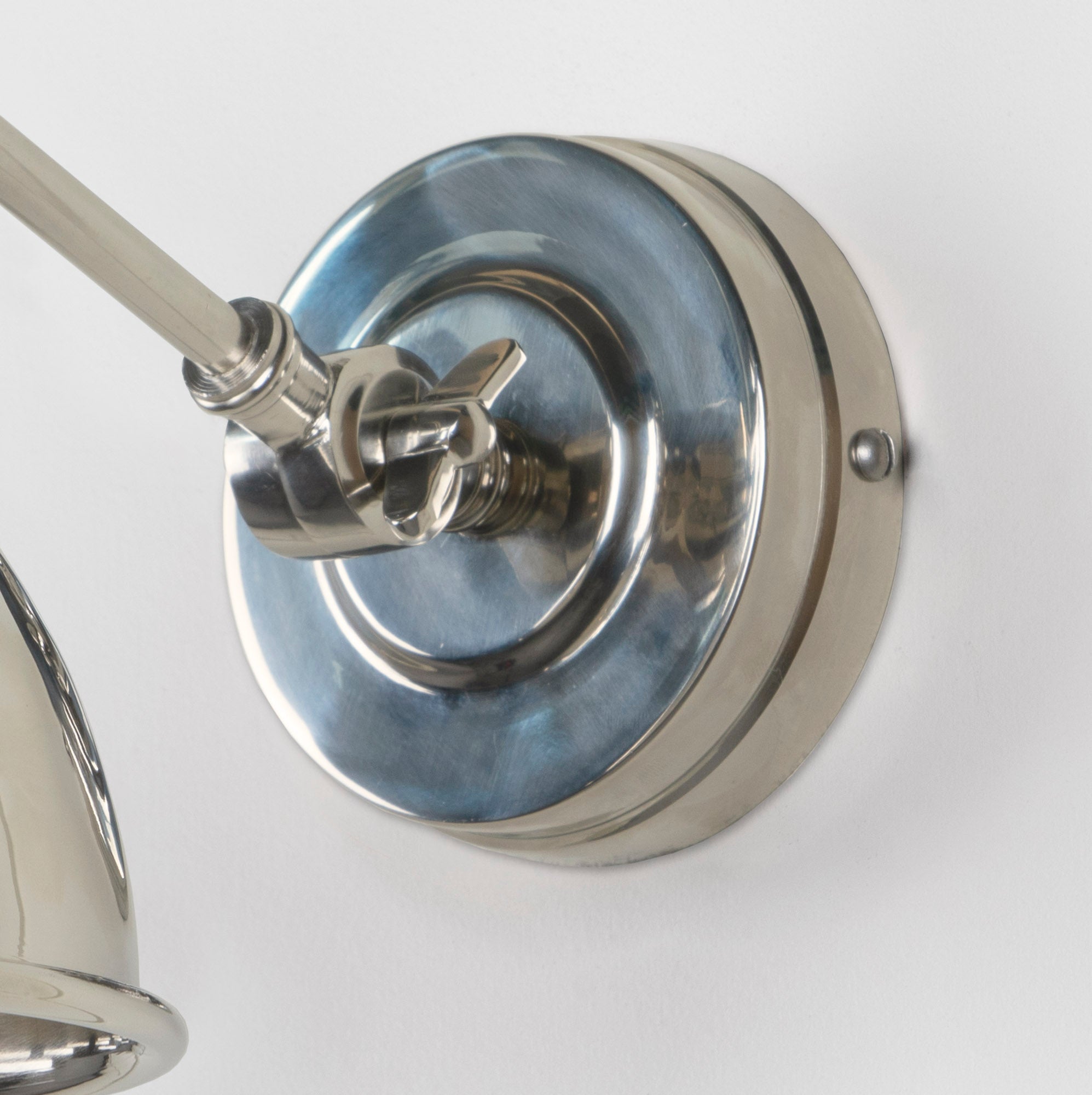 Smooth Nickel Brindley Wall Light , close up view of fitting and cable.