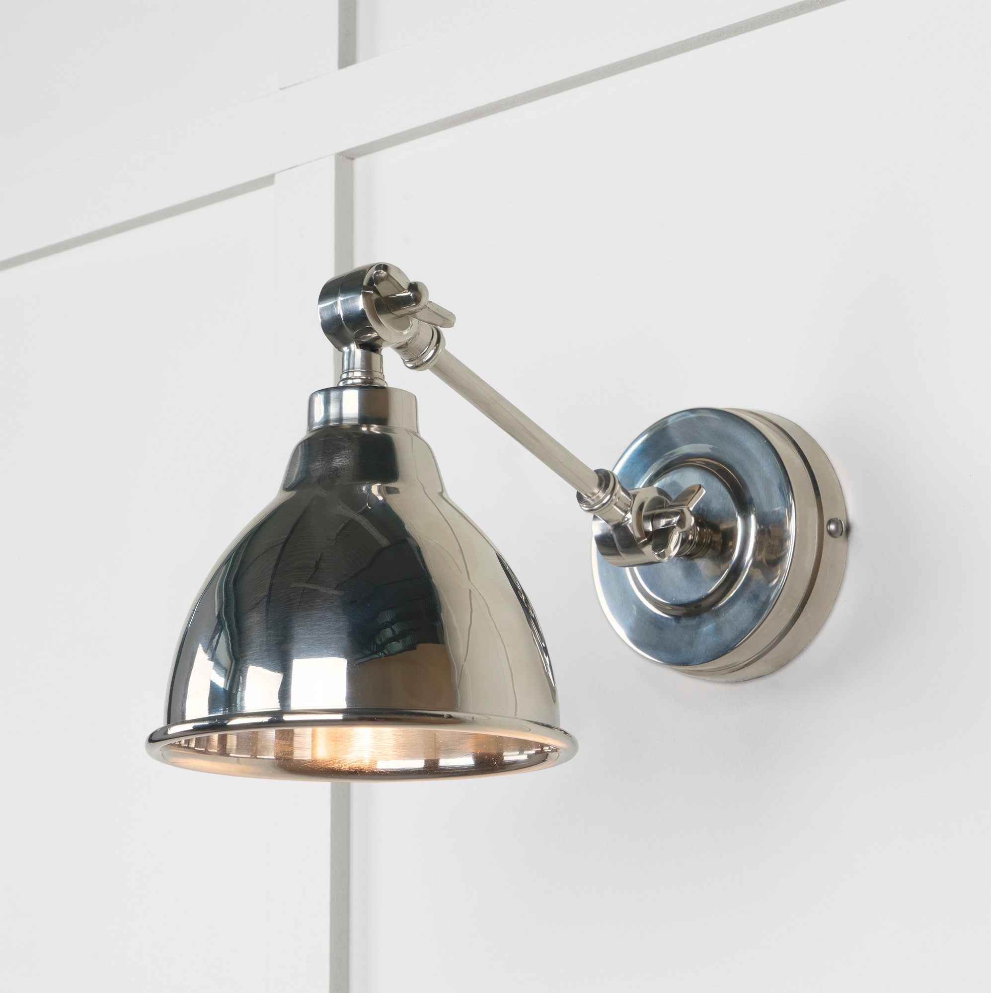 Smooth Nickel Brindley Wall Light , Front Side with light on.