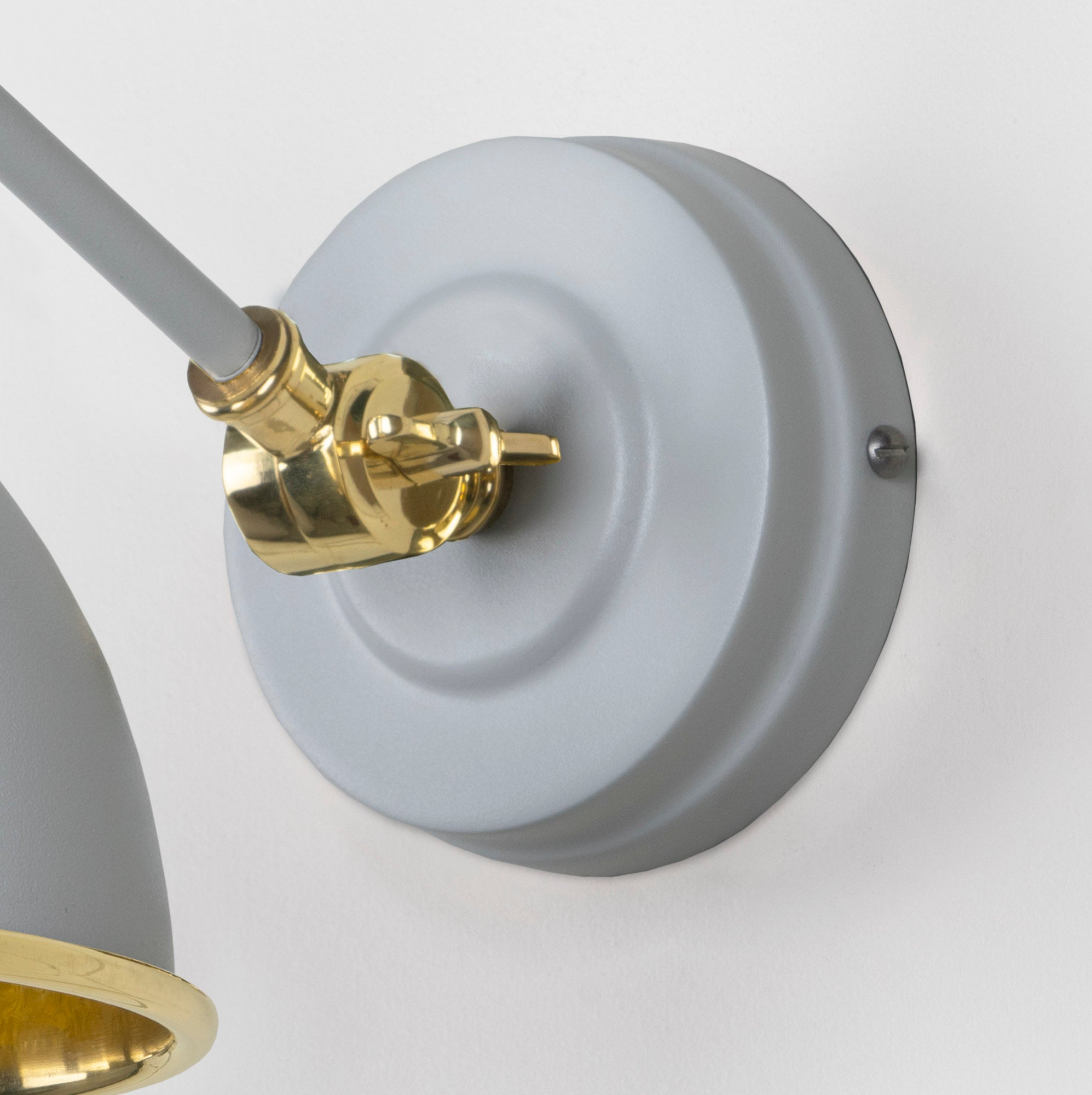 Smooth Brass Brindley Wall Light Birch, close up view of fitting and cable.