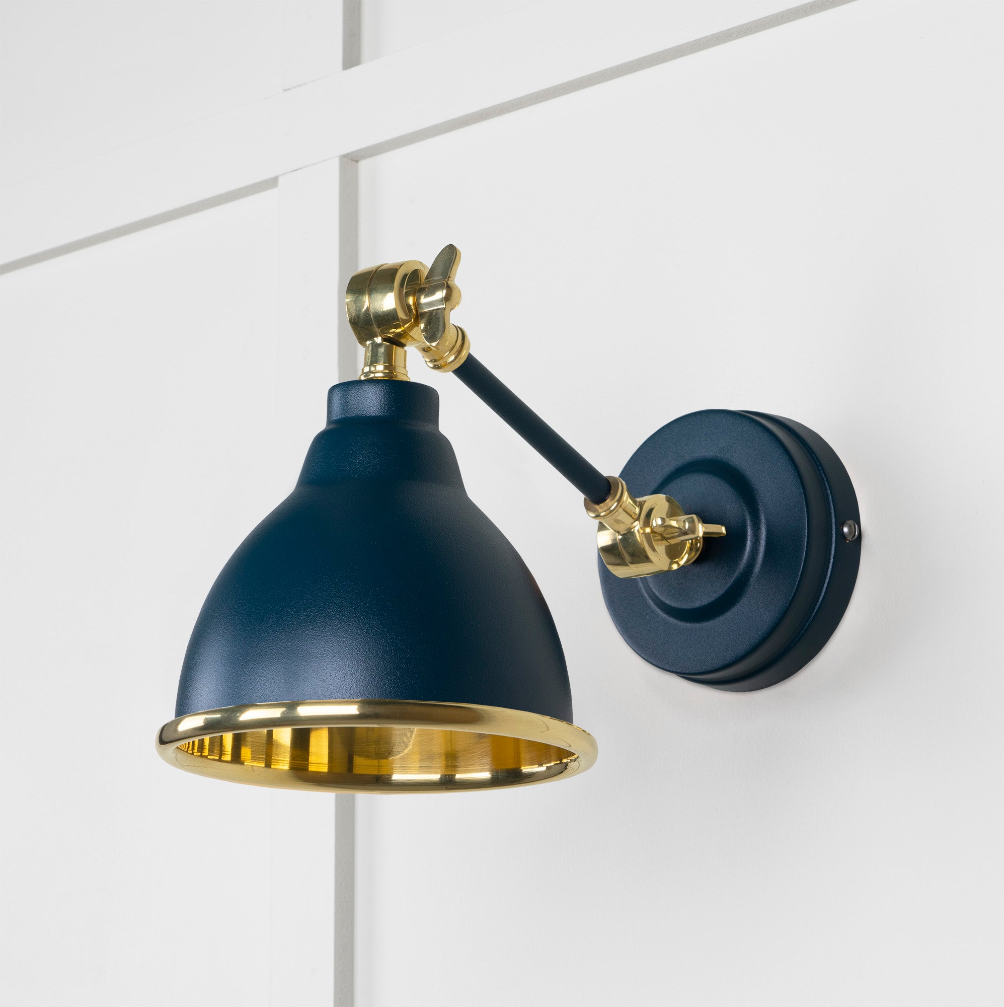 Smooth Brass Brindley Wall Light Dusk, Front Side.