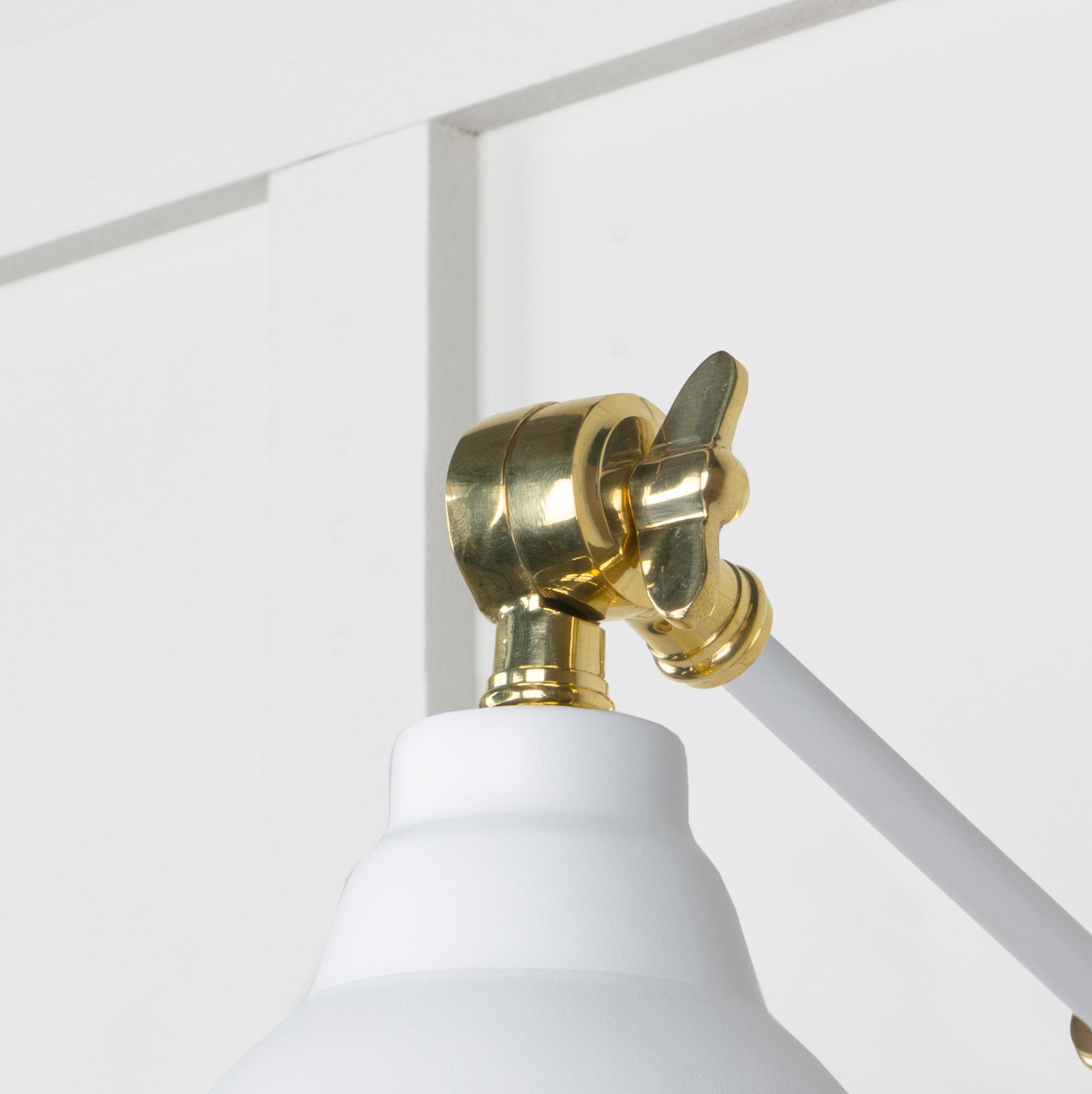 Smooth Brass Brindley Wall Light Flock, Detailed close up view of pendant.