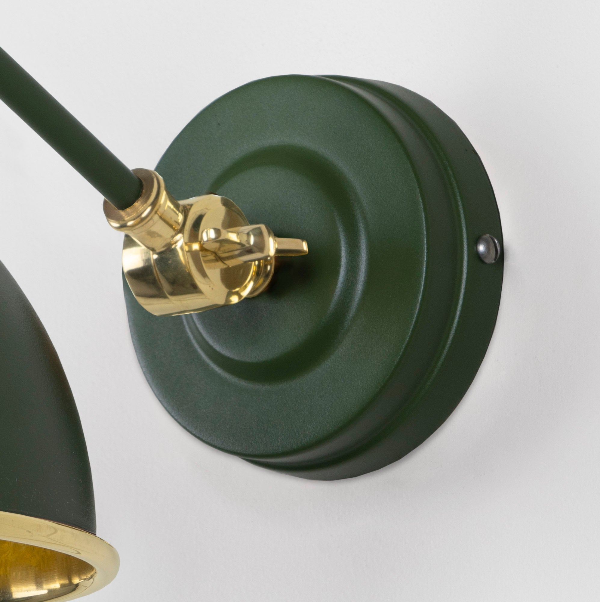 Smooth Brass Brindley Wall Light Heath, close up view of fitting and cable.