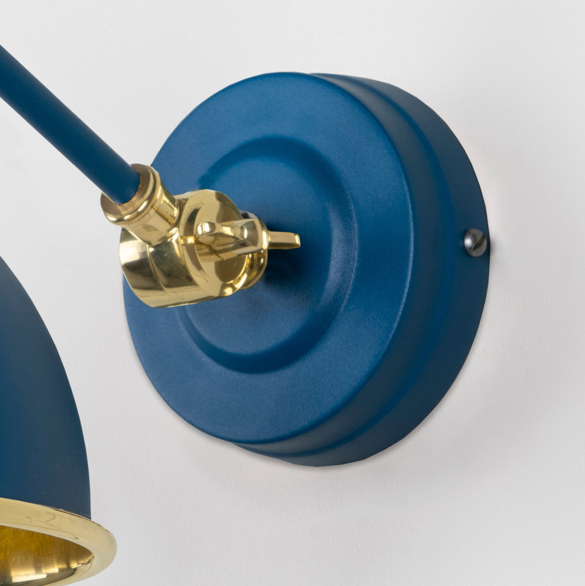 Smooth Brass Brindley Wall Light Upstream, close up view of fitting and cable.
