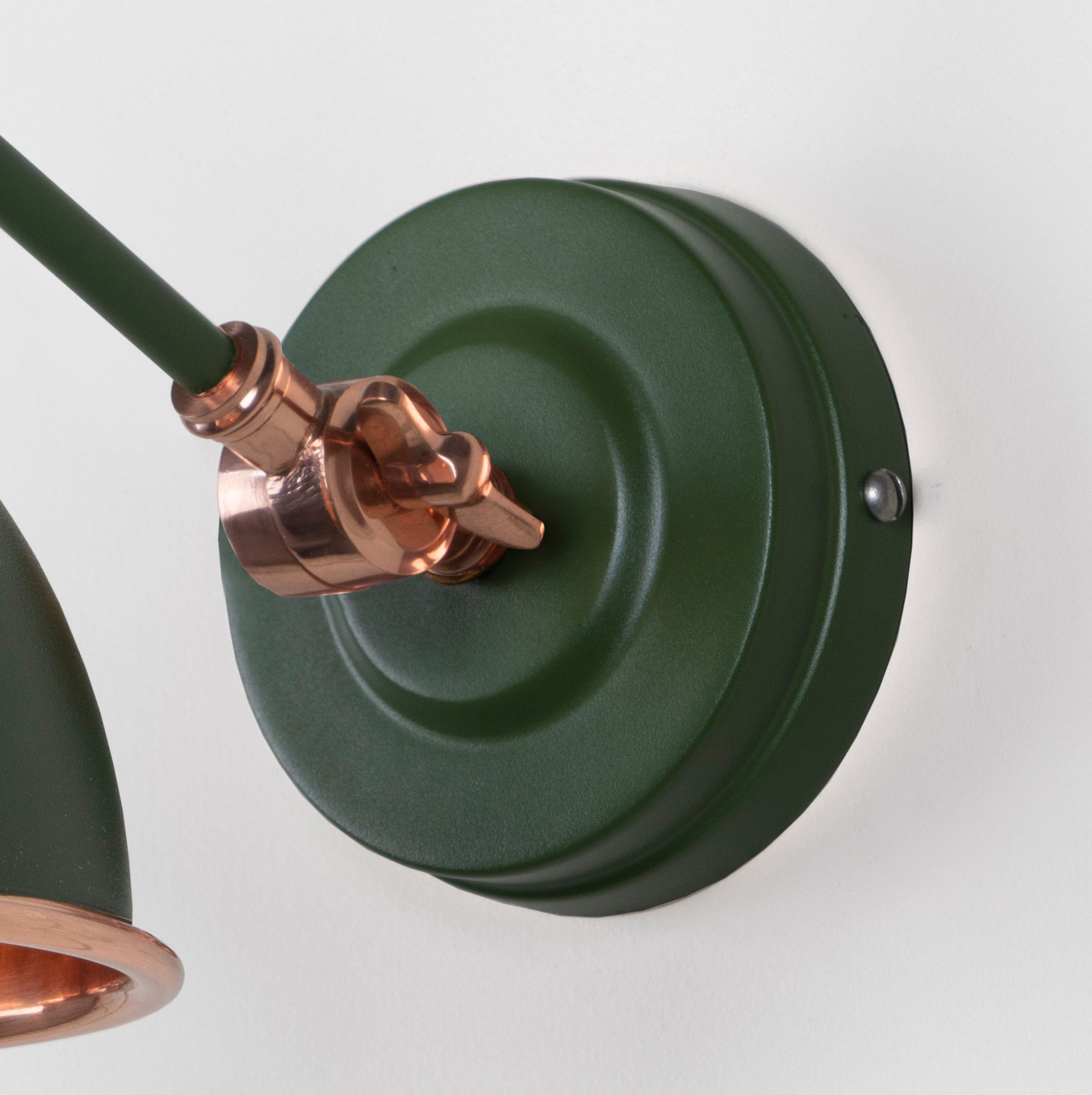 Hammered Copper Brindley Wall Light Heath, close up view of fitting and cable.