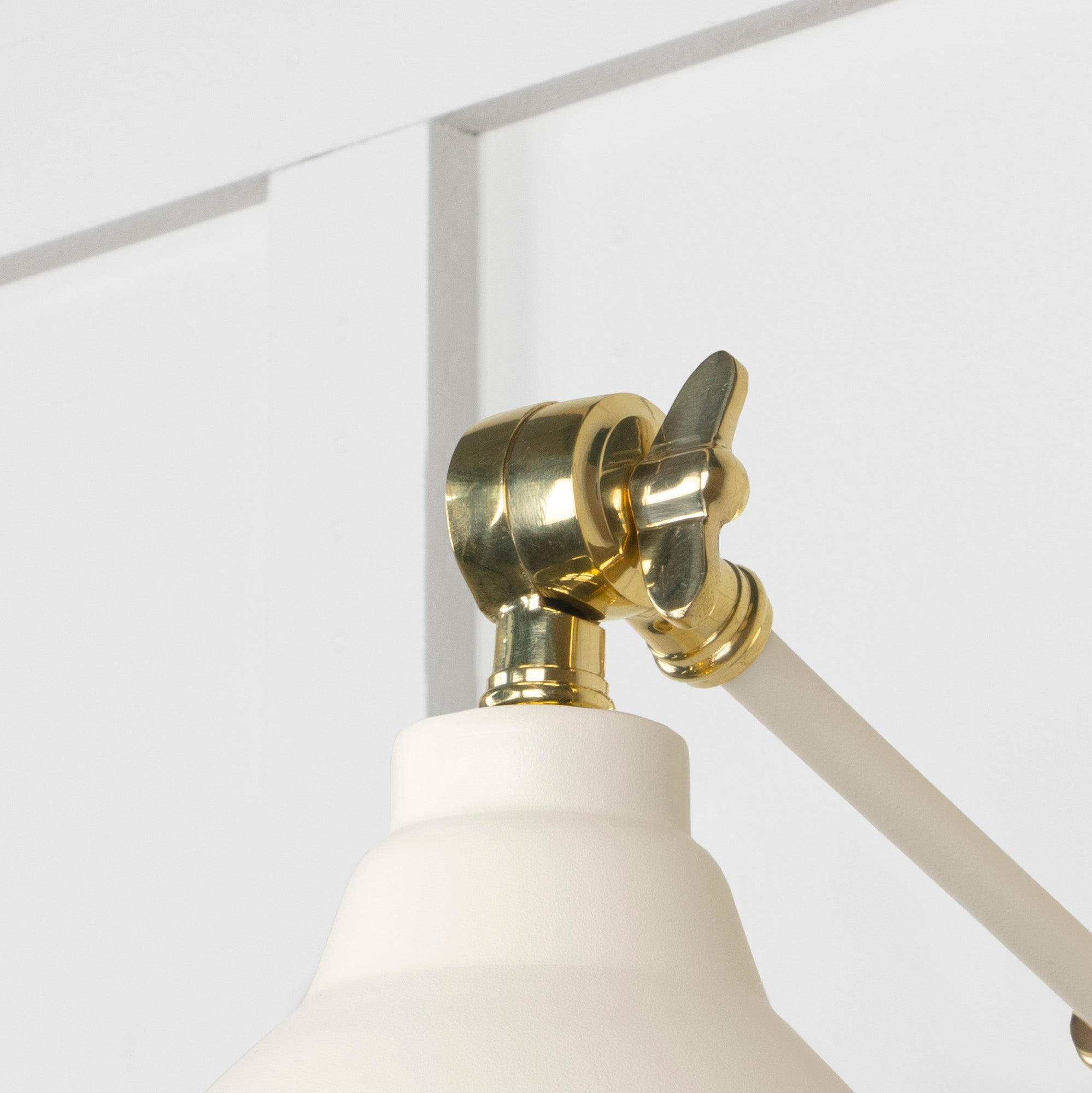 Hammered Brass Brindley Wall Light Teasel, Detailed close up view of pendant.