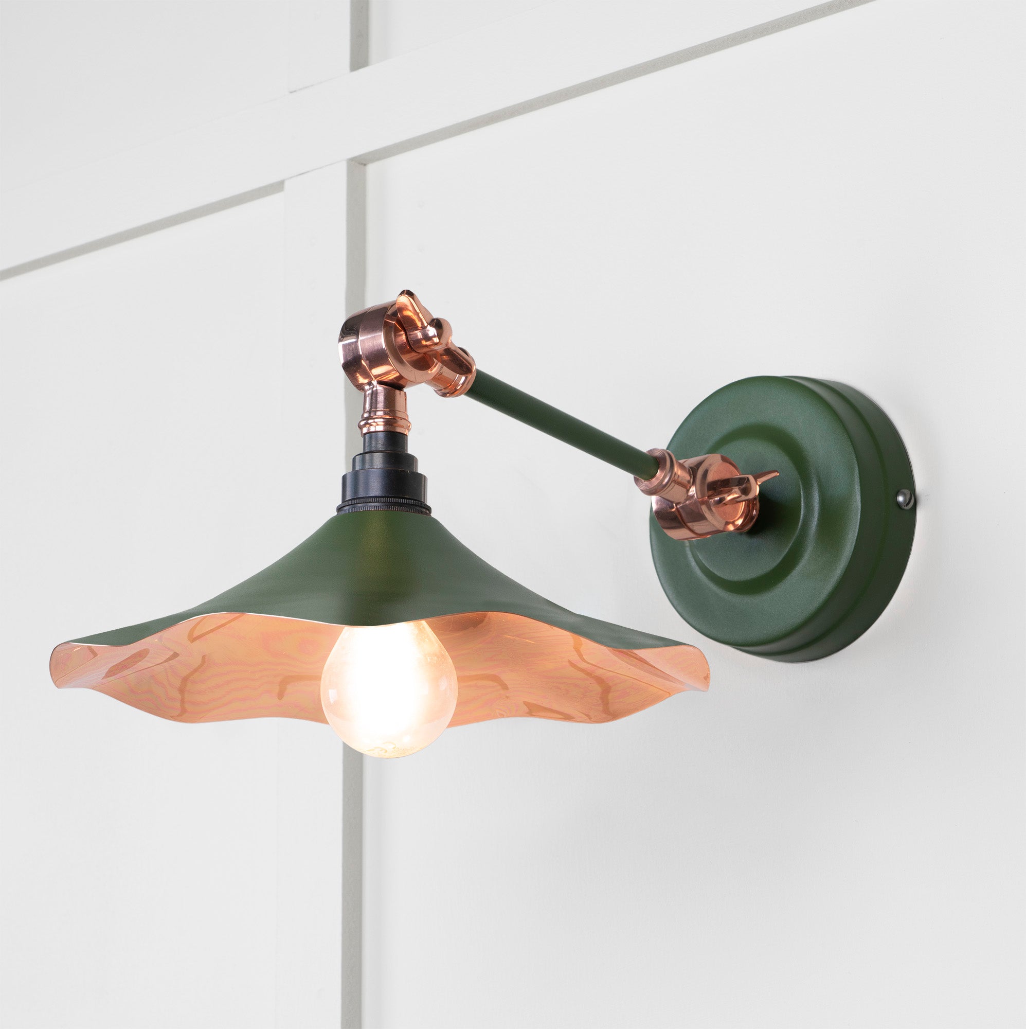 Smooth Copper Flora Wall Light Heath, Front Side with light on.