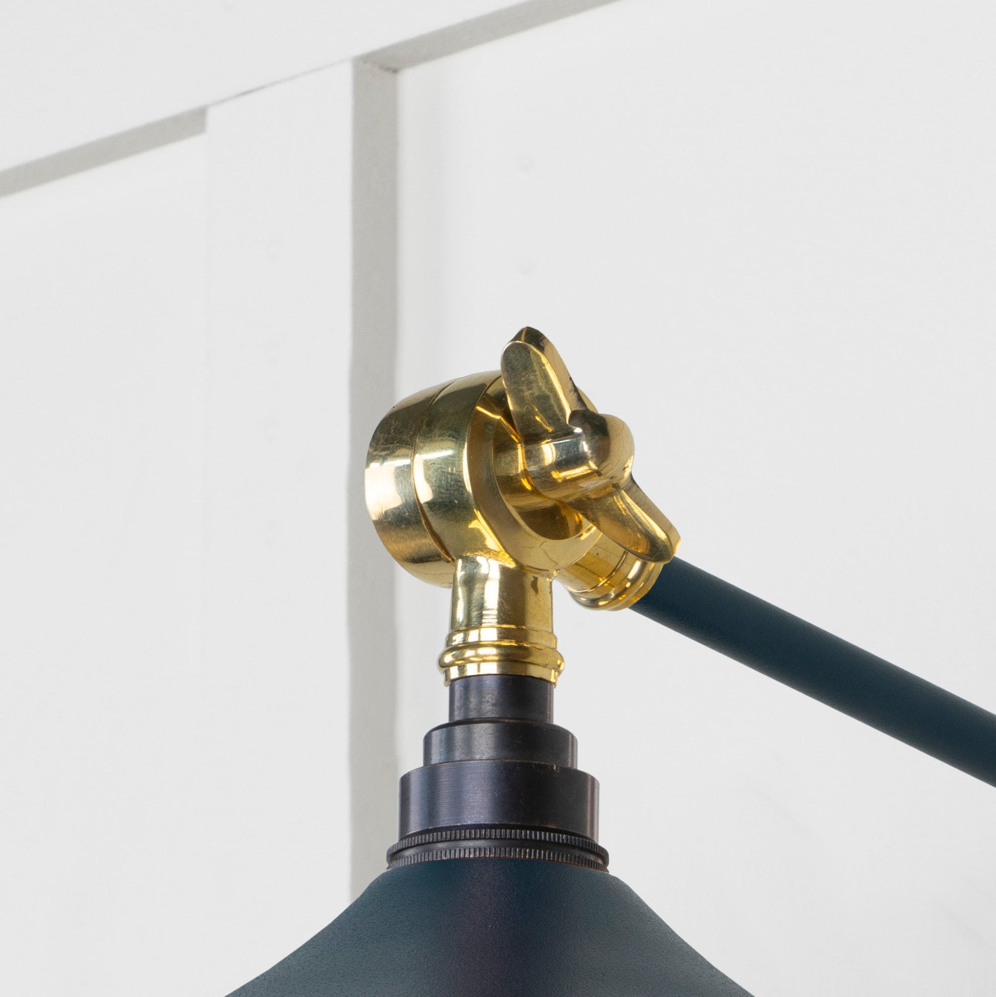 Smooth Brass Flora Wall Light Dusk, Detailed close up view of pendant.