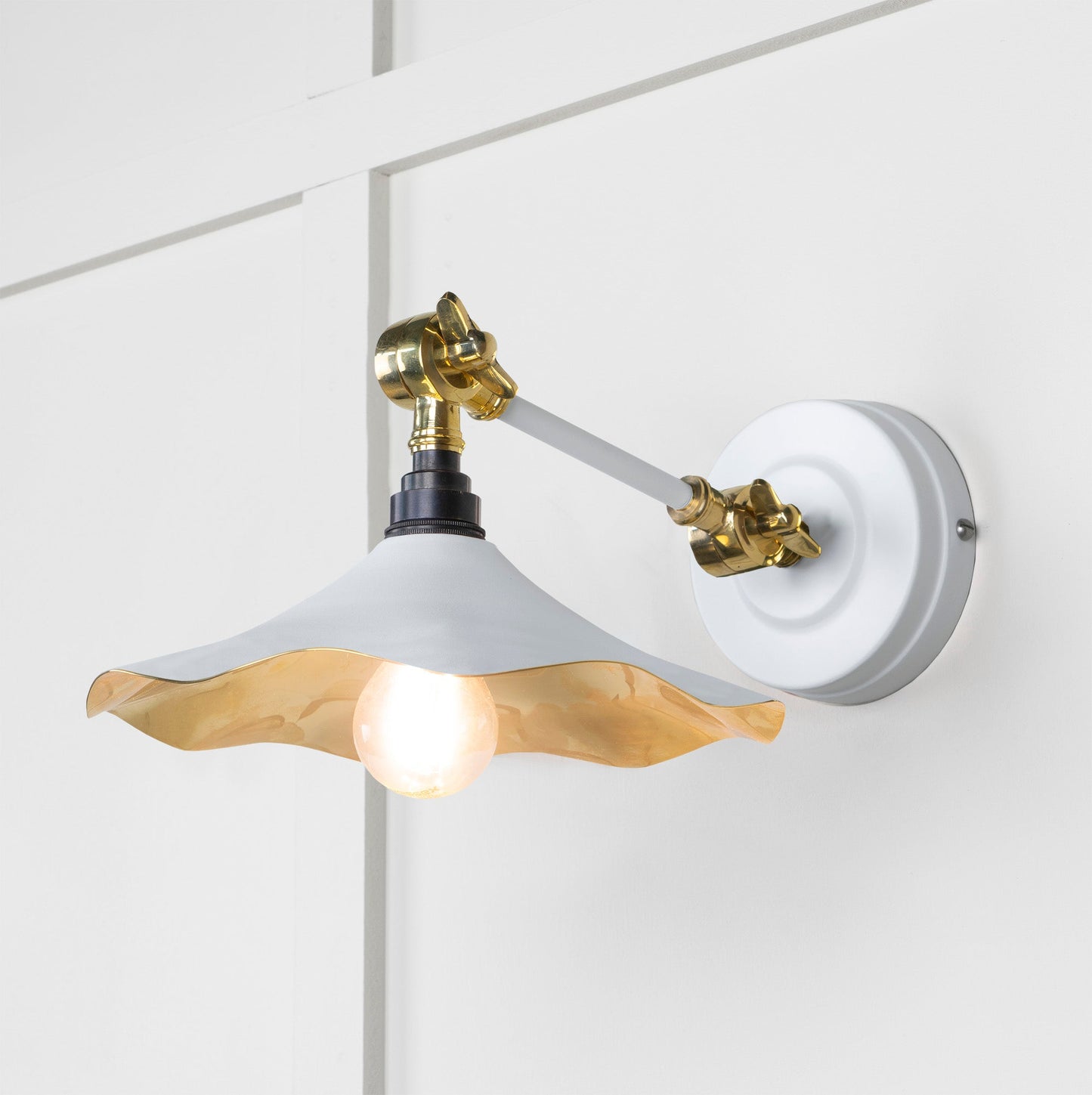 Smooth Brass Flora Wall Light Flock, Front Side with light on.