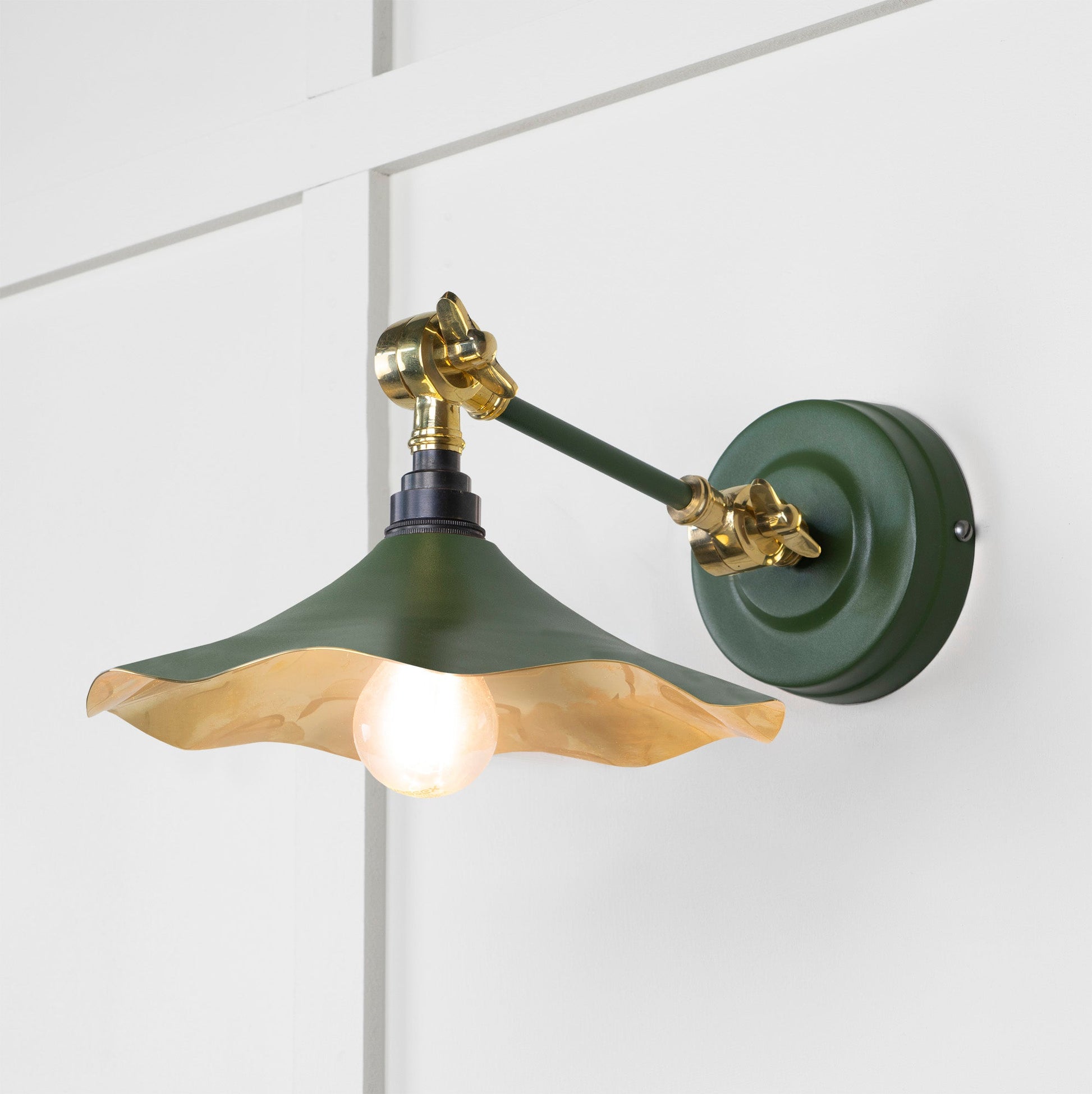 Smooth Brass Flora Wall Light Heath, Front Side with light on.