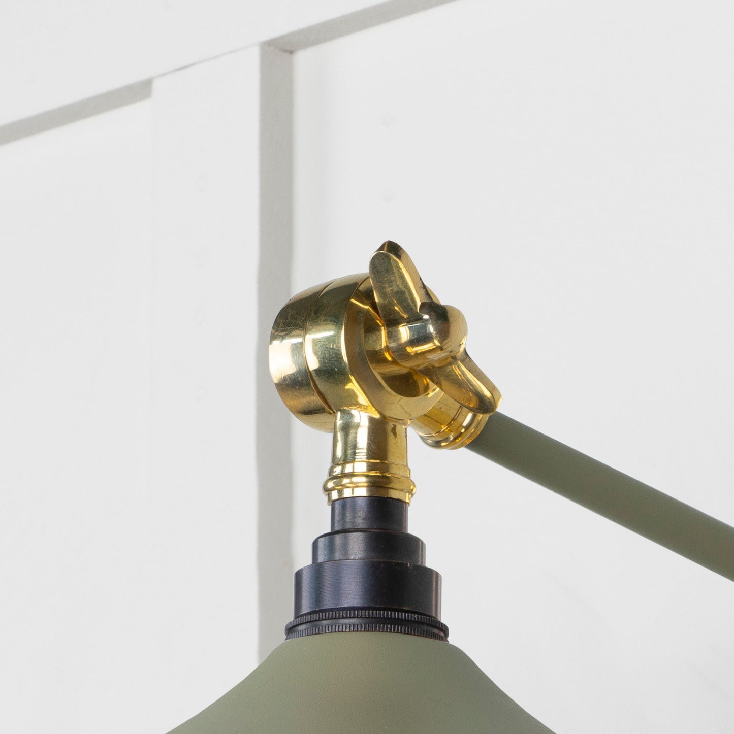 Smooth Brass Flora Wall Light Tump, Detailed close up view of pendant.