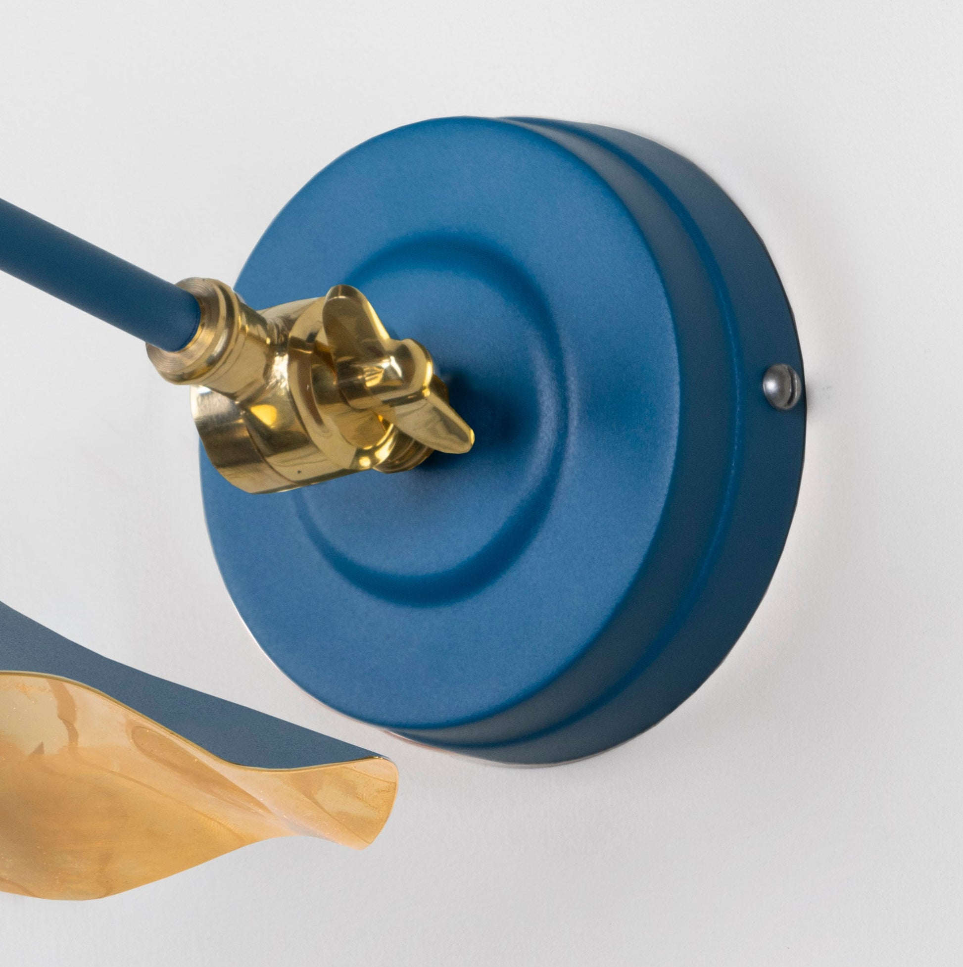 Smooth Brass Flora Wall Light Upstream, close up view of fitting and cable.