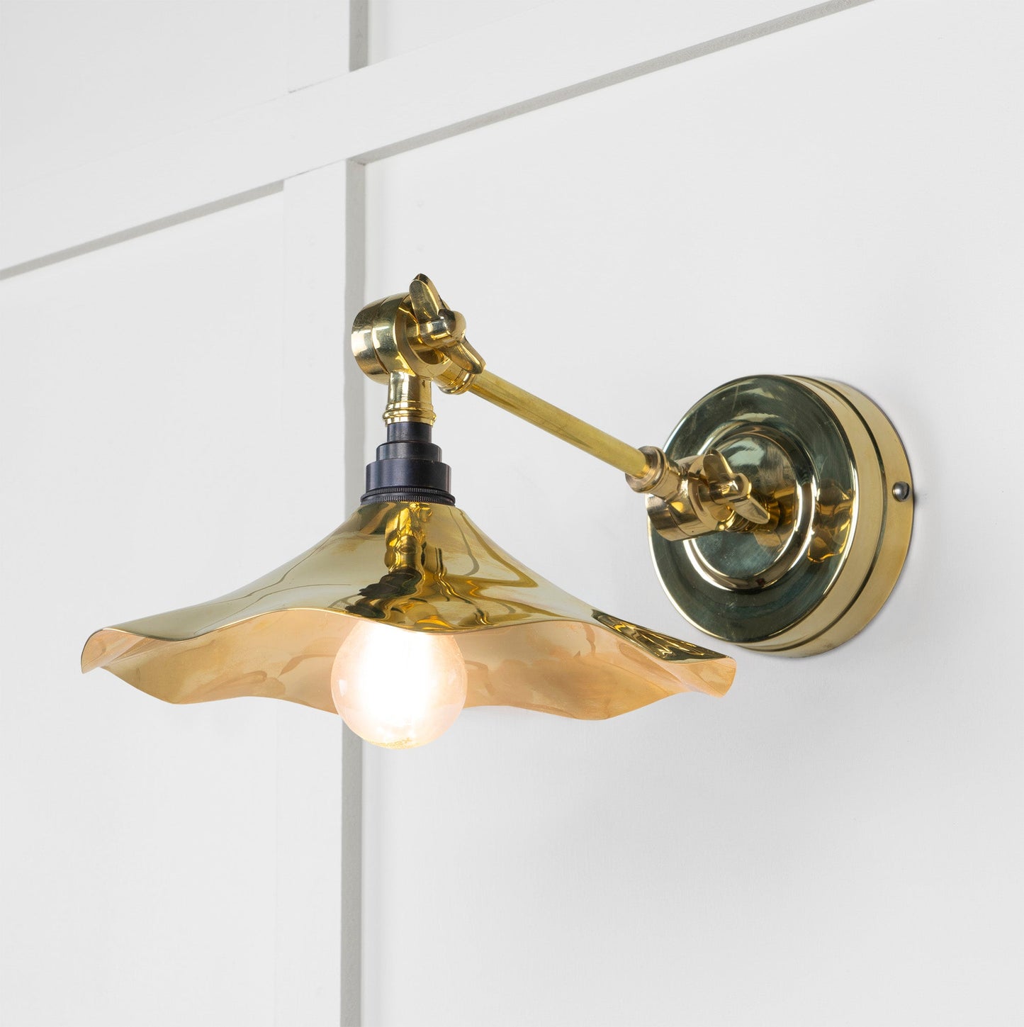 Smooth Brass Flora Wall Light , Front Side with light on.