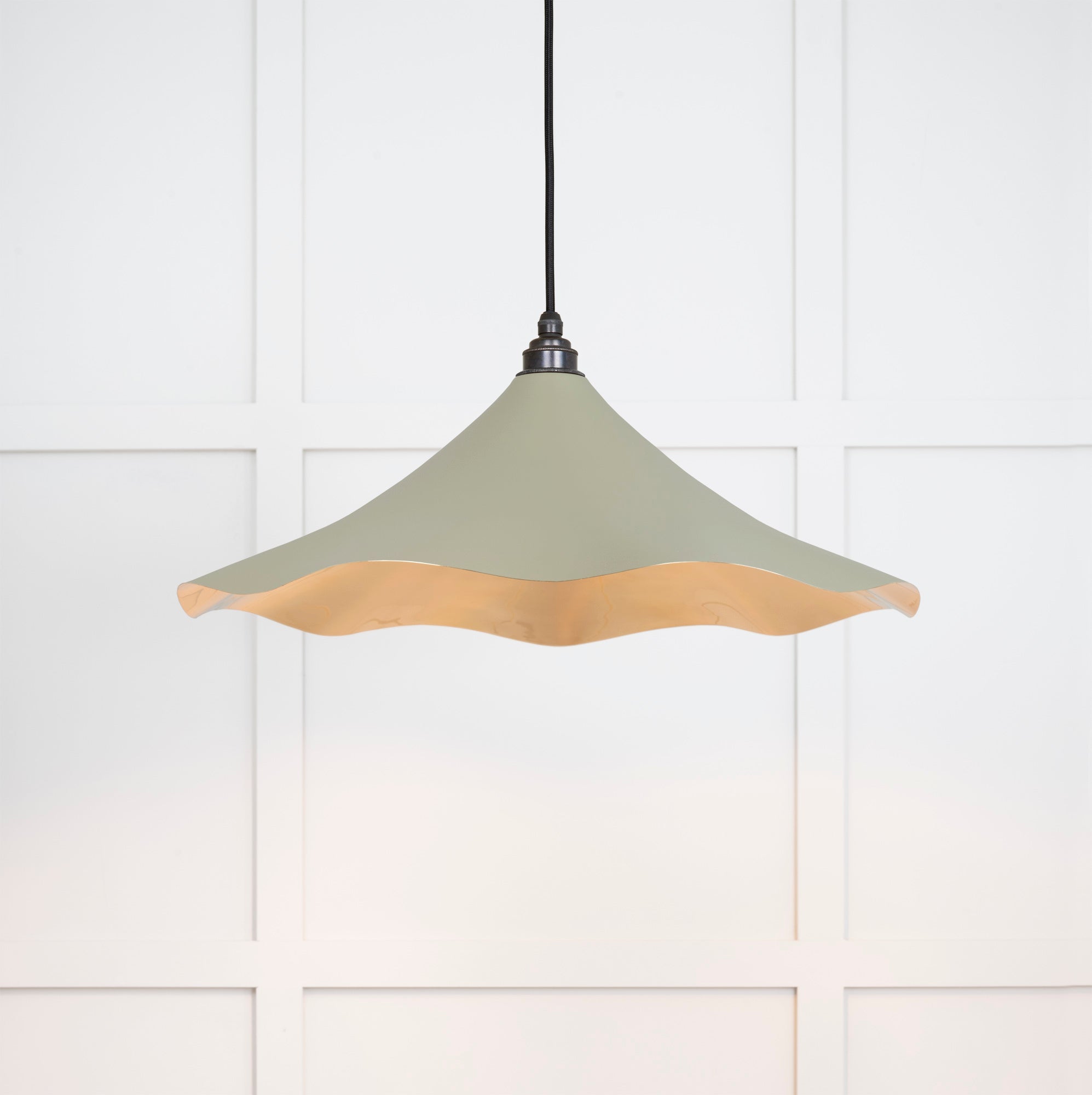 Smooth Brass Flora Pendant Light Tump, Front Side with light on.