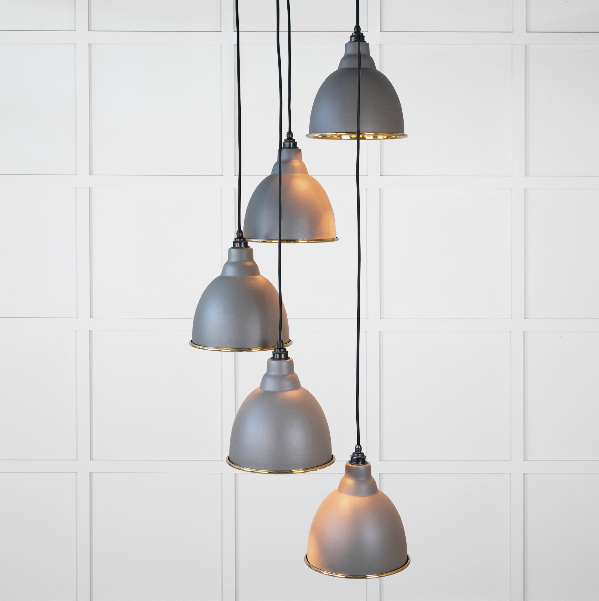 Smooth Brass Brindley Cluster Pendant Light Bluff, Front Side with light on.