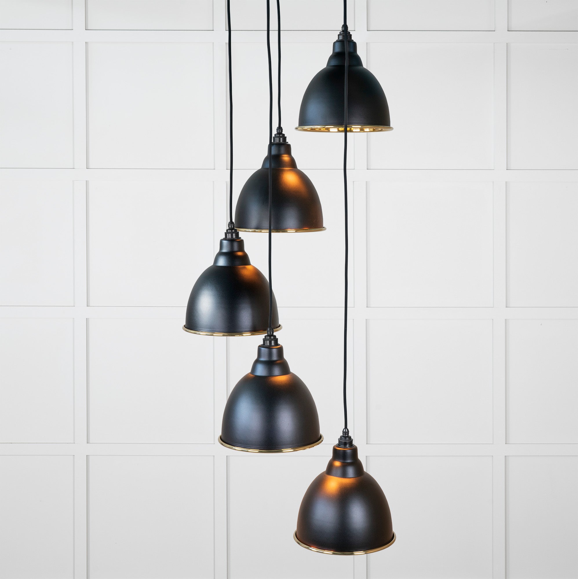 Smooth Brass Brindley Cluster Pendant Light Elan Black, Front Side with light on.