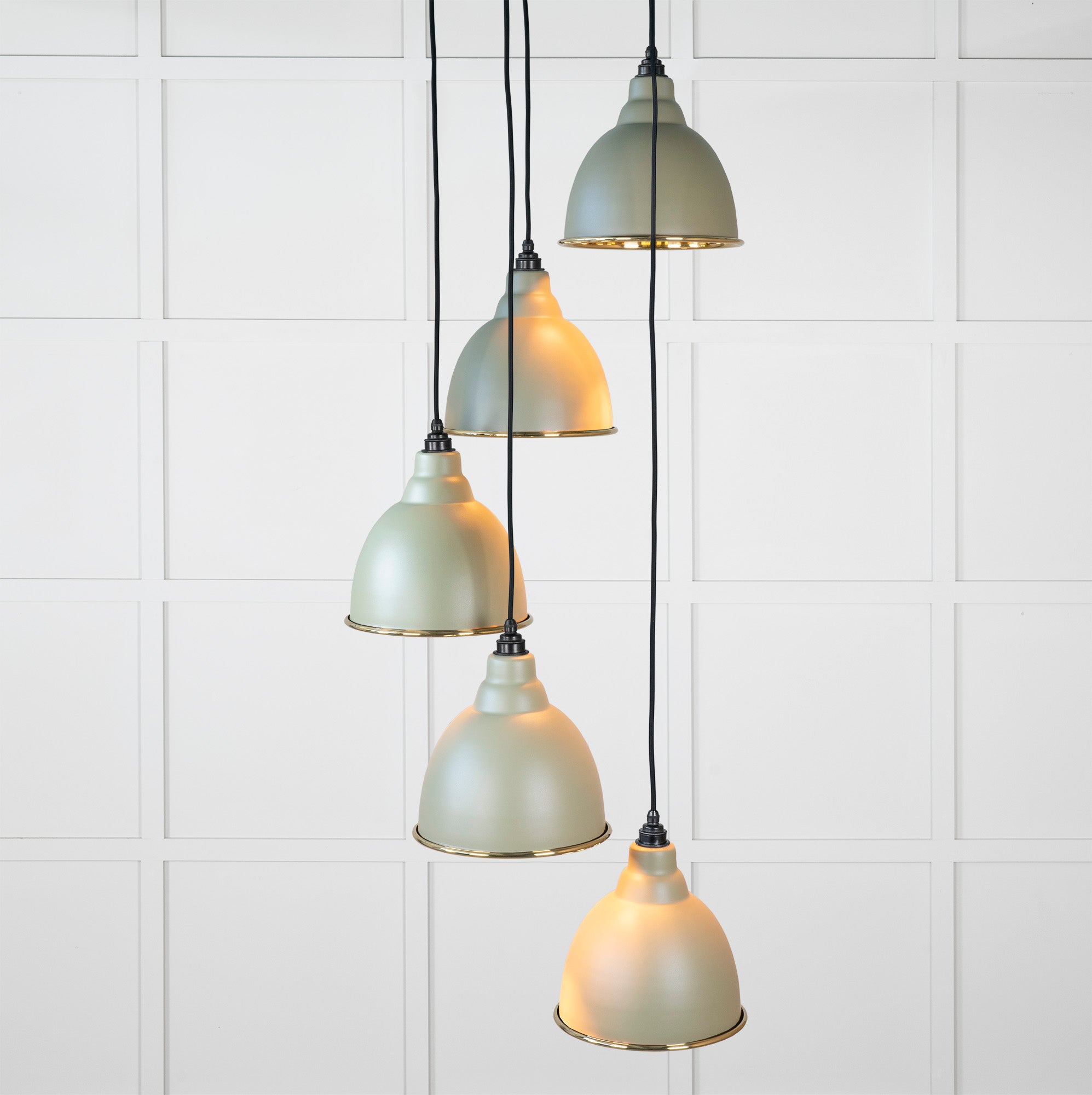 Smooth Brass Brindley Cluster Pendant Light Tump, Front Side with light on.