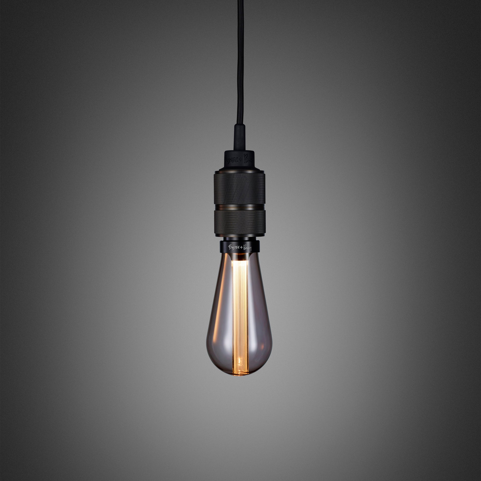 Hooked 1.0 Pendant Light / Nude Smoked bronze, close up view with smoked bulb.