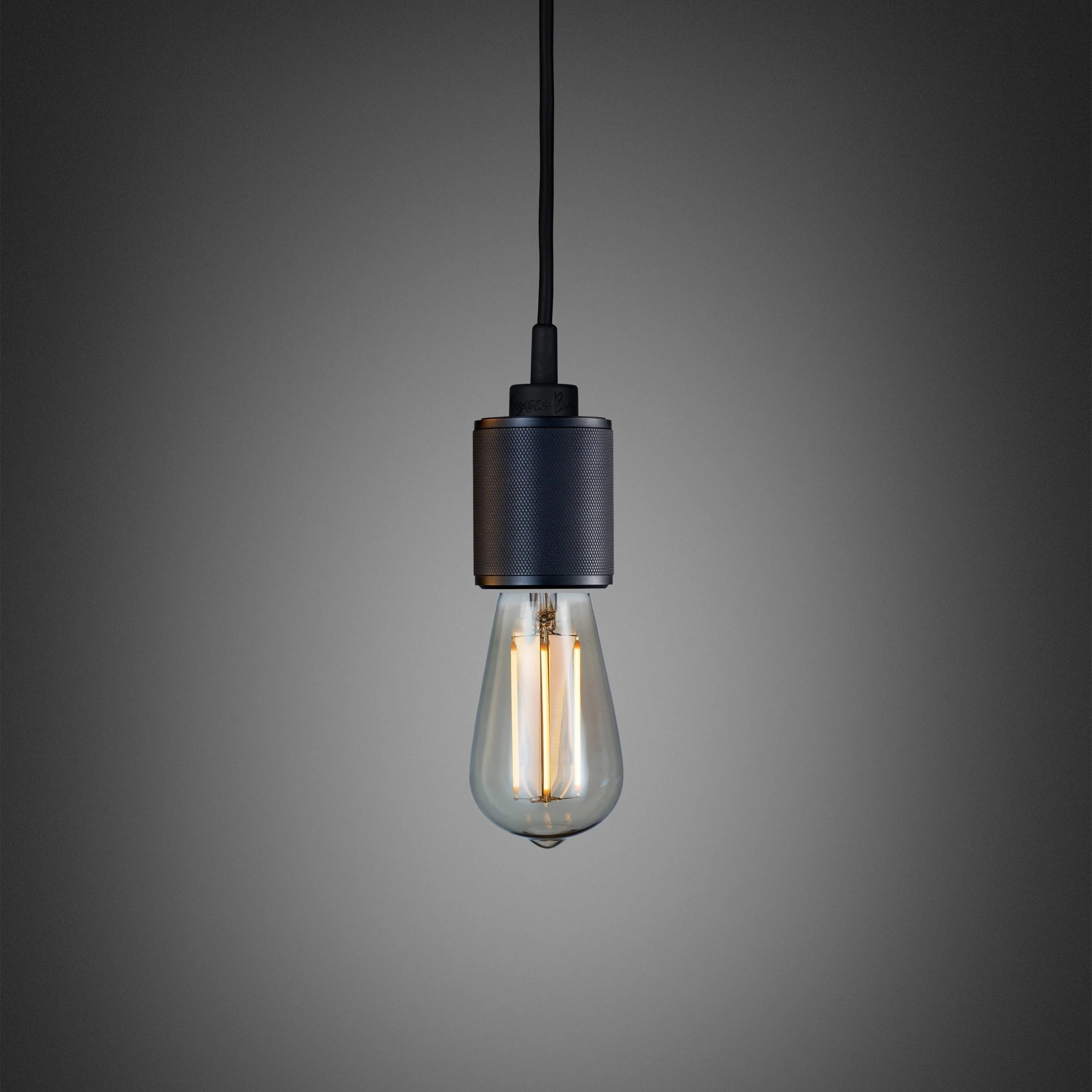 Heavy Metal Pendant light / Cross smoked bronze, front view.