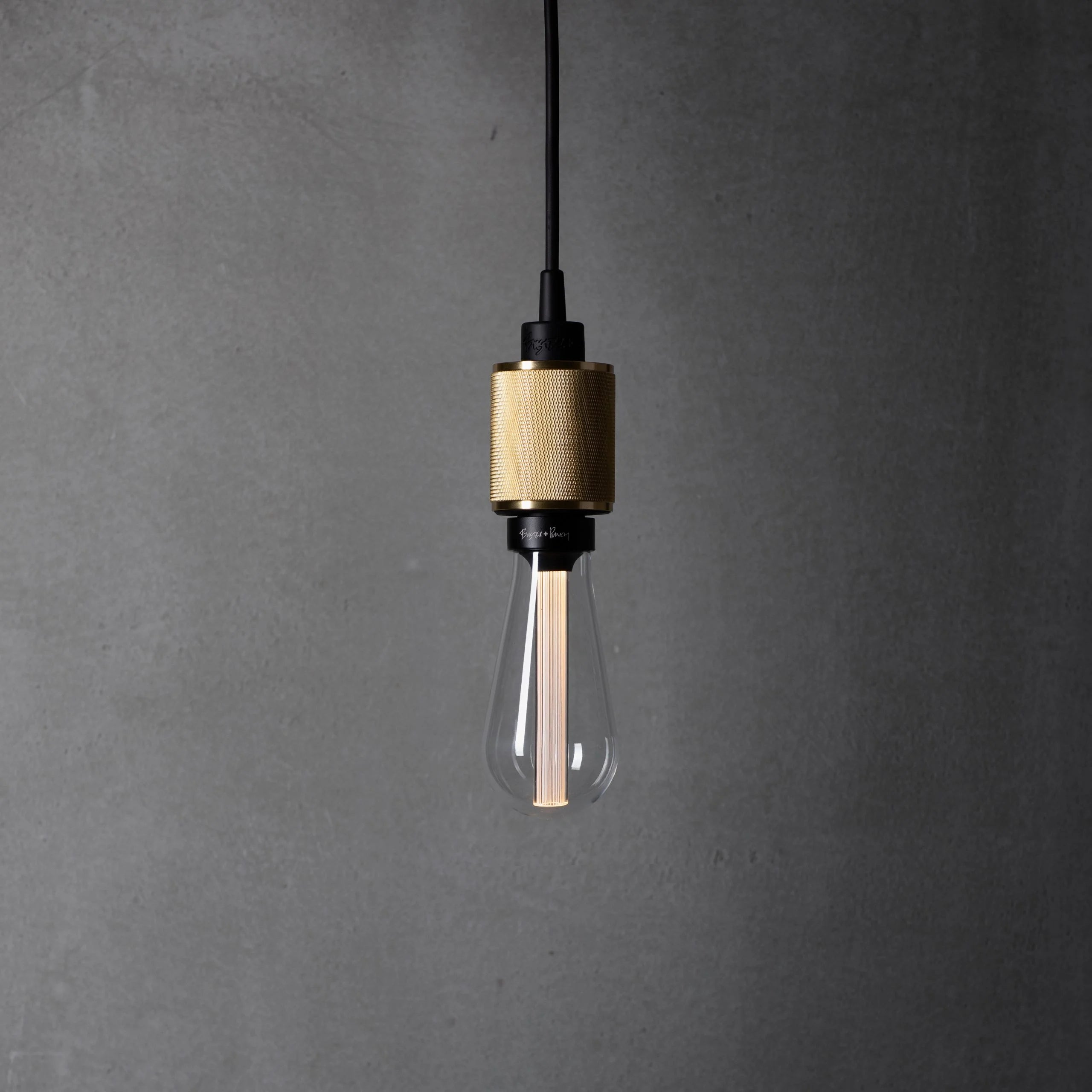 Heavy Metal Pendant light / Cross Brass, front view. 