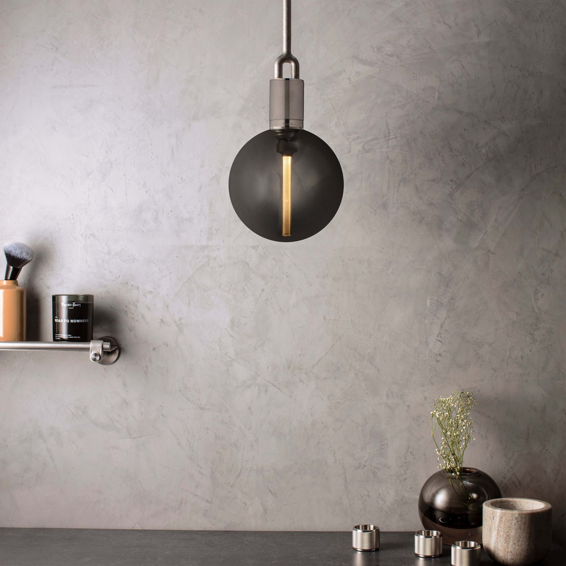 Forked Pendant Light / Globe / Smoked / Large steel, front view with background.