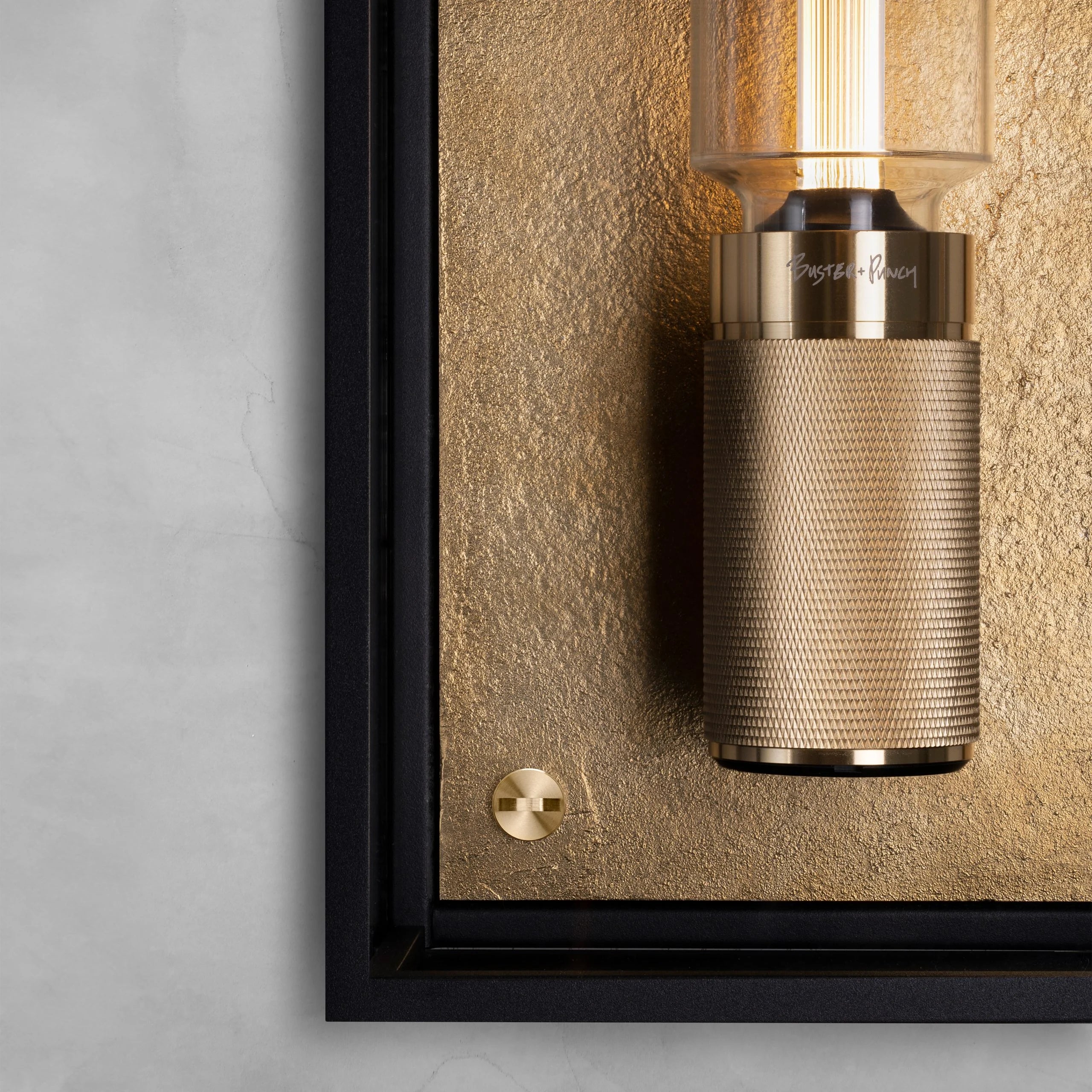 Caged Wet / Wall / Large brass, detailed close up of fitting.
