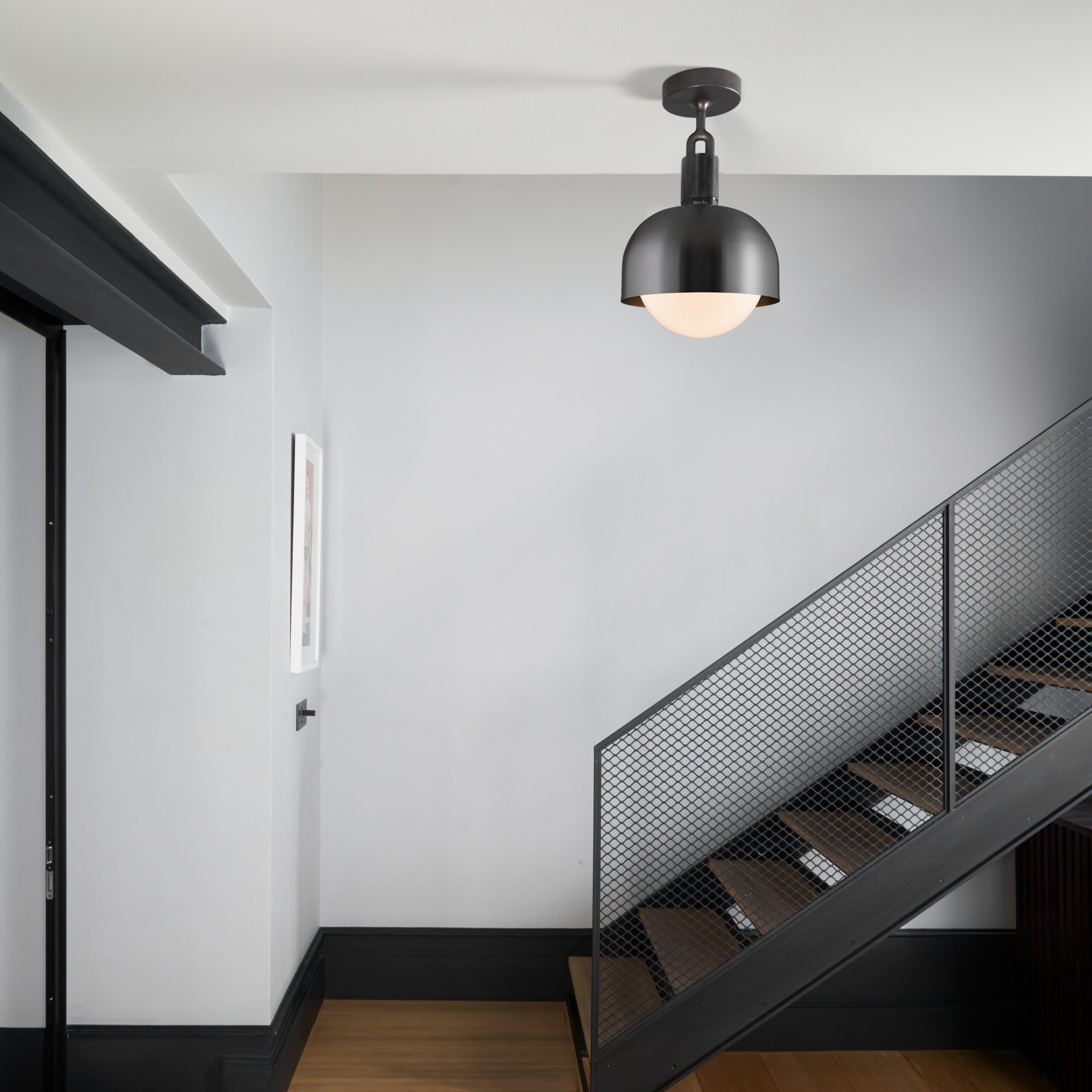 Forked Ceiling Light / Shade / Globe / Opal / Medium Gun metal, in hallway setting.
