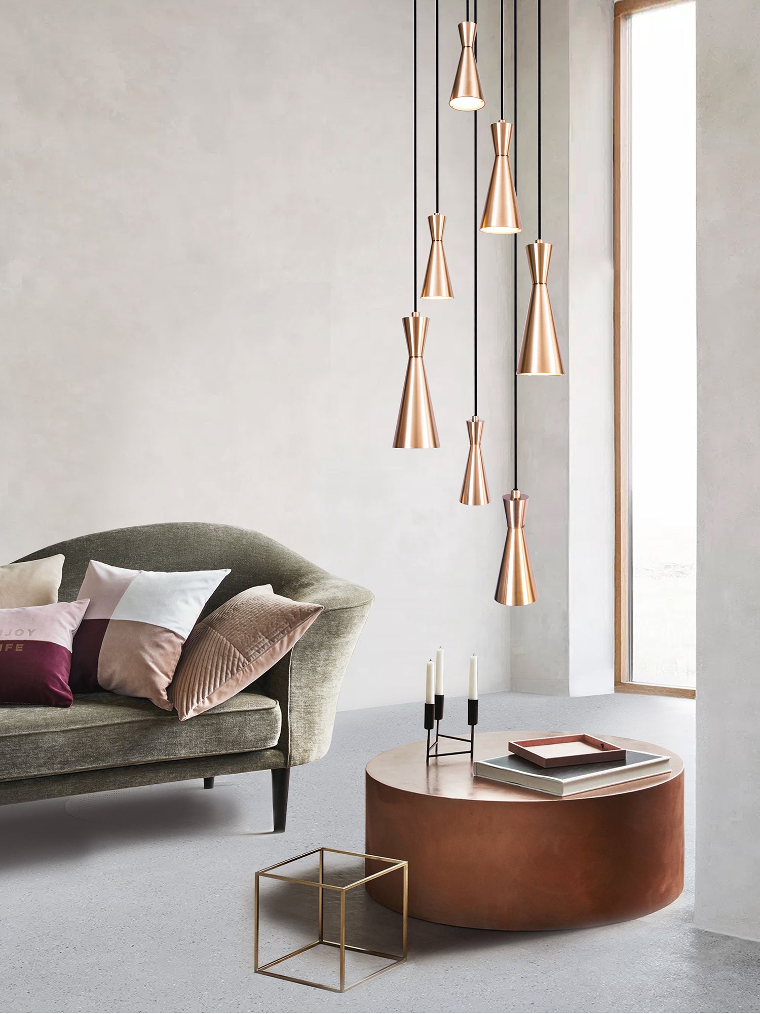 Cone 7 Cluster Light, hanging from ceiling in living room setting.