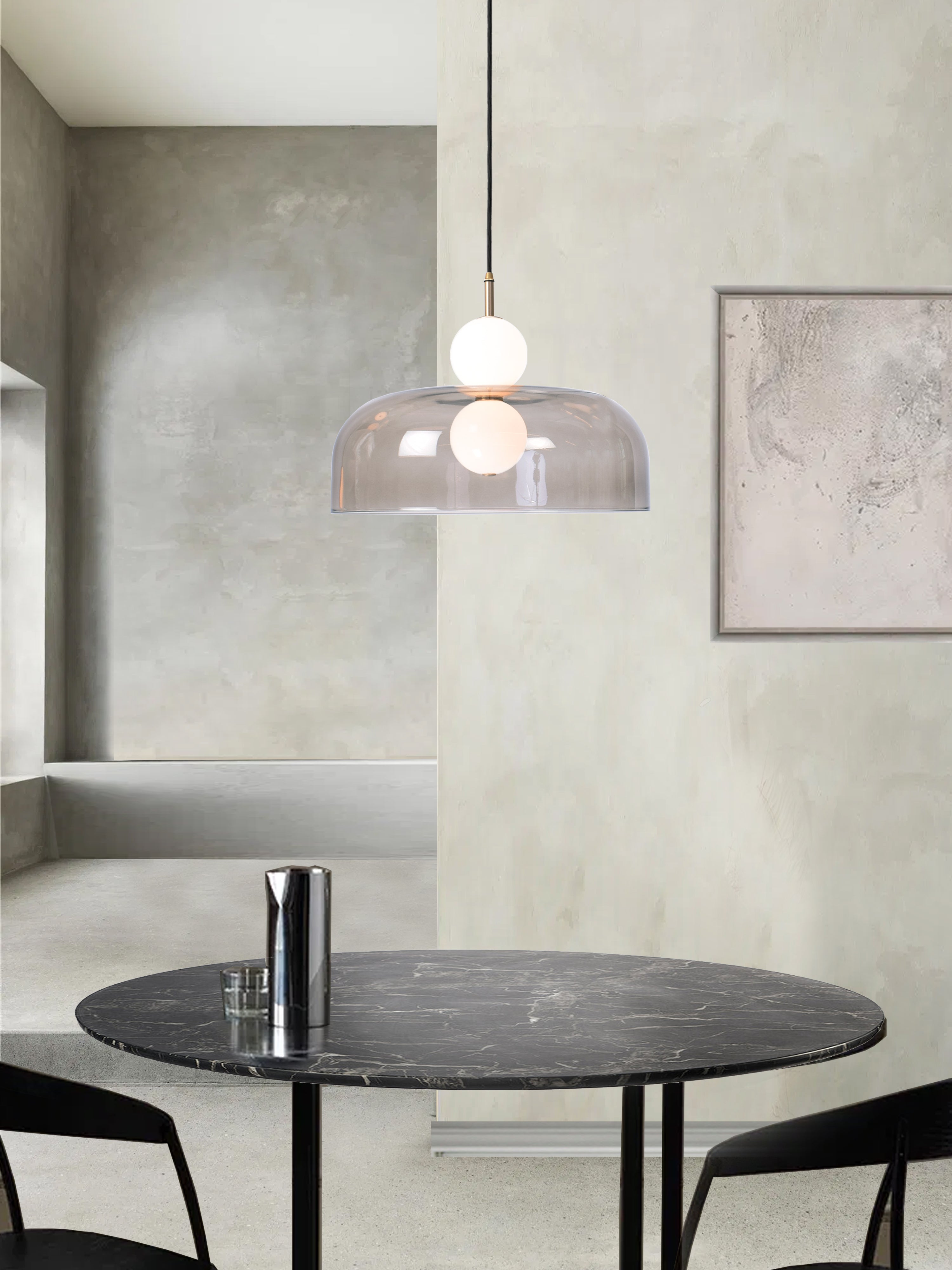 Echo Shade Pendant Light, hanging from ceiling above table in setting.