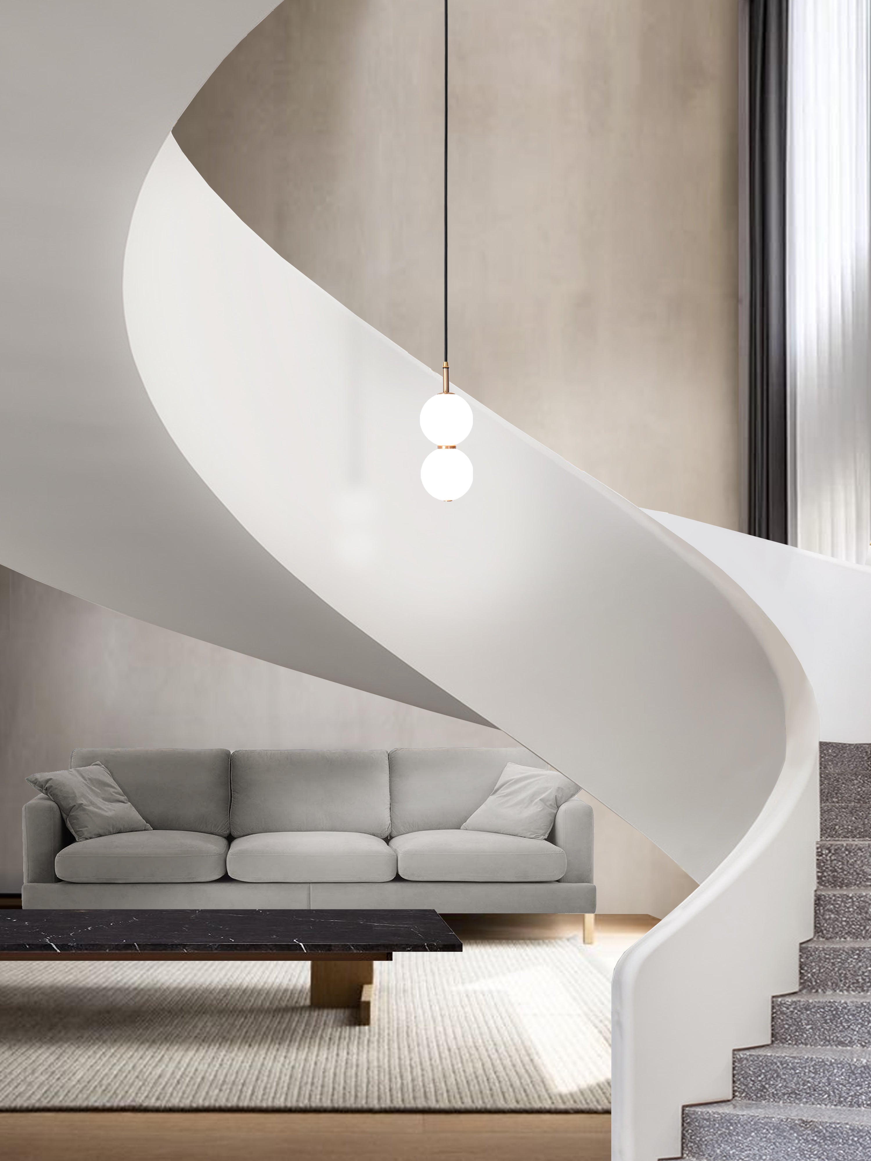 Echo Pendant Light. hanging from ceiling through stairway.