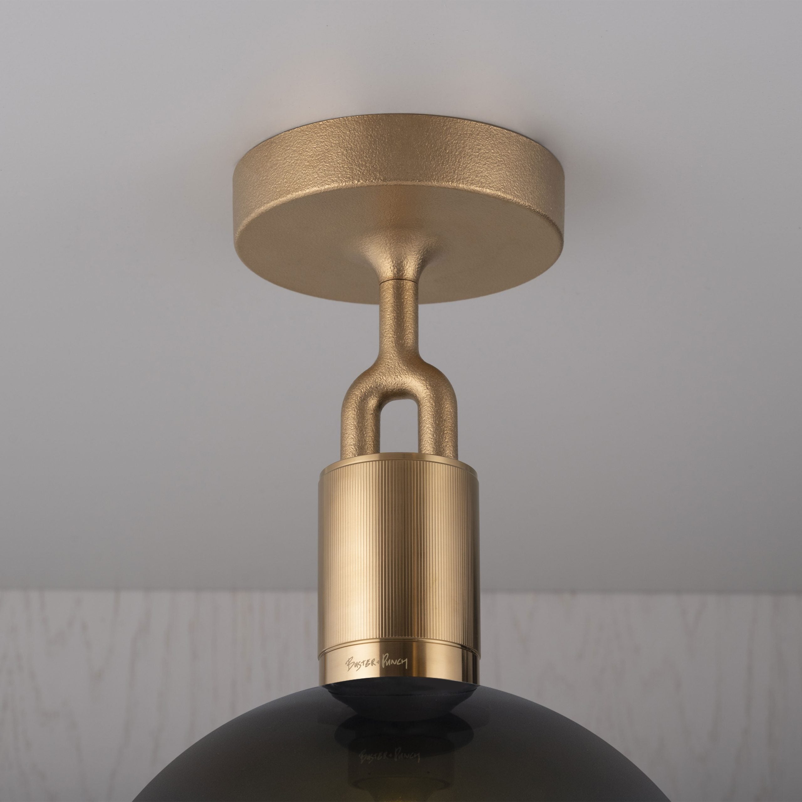 Forked Ceiling Light / Globe / Smoked / Medium Brass, detailed close up of fork and fitting.