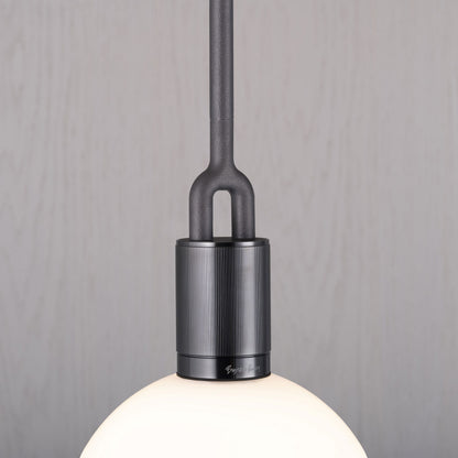 Forked pendant Light / Globe / Opal / Medium gun metal, detailed close up of fork.