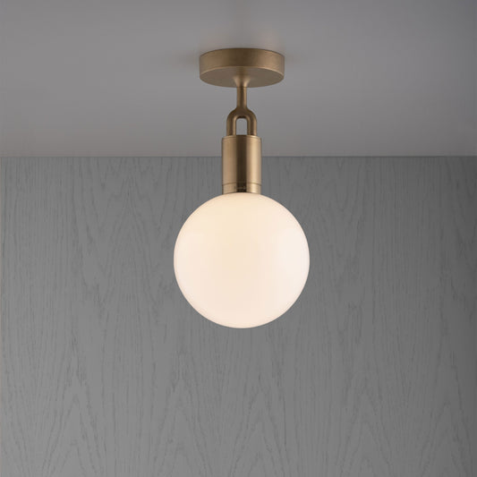 Forked Ceiling Light / Globe / Opal / Medium Brass, front view.