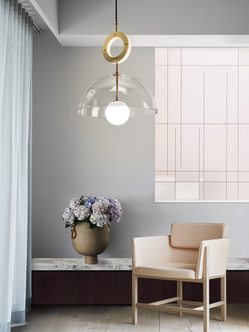 Deco Pendant and Ring Light, clear hanging from ceiling in setting.