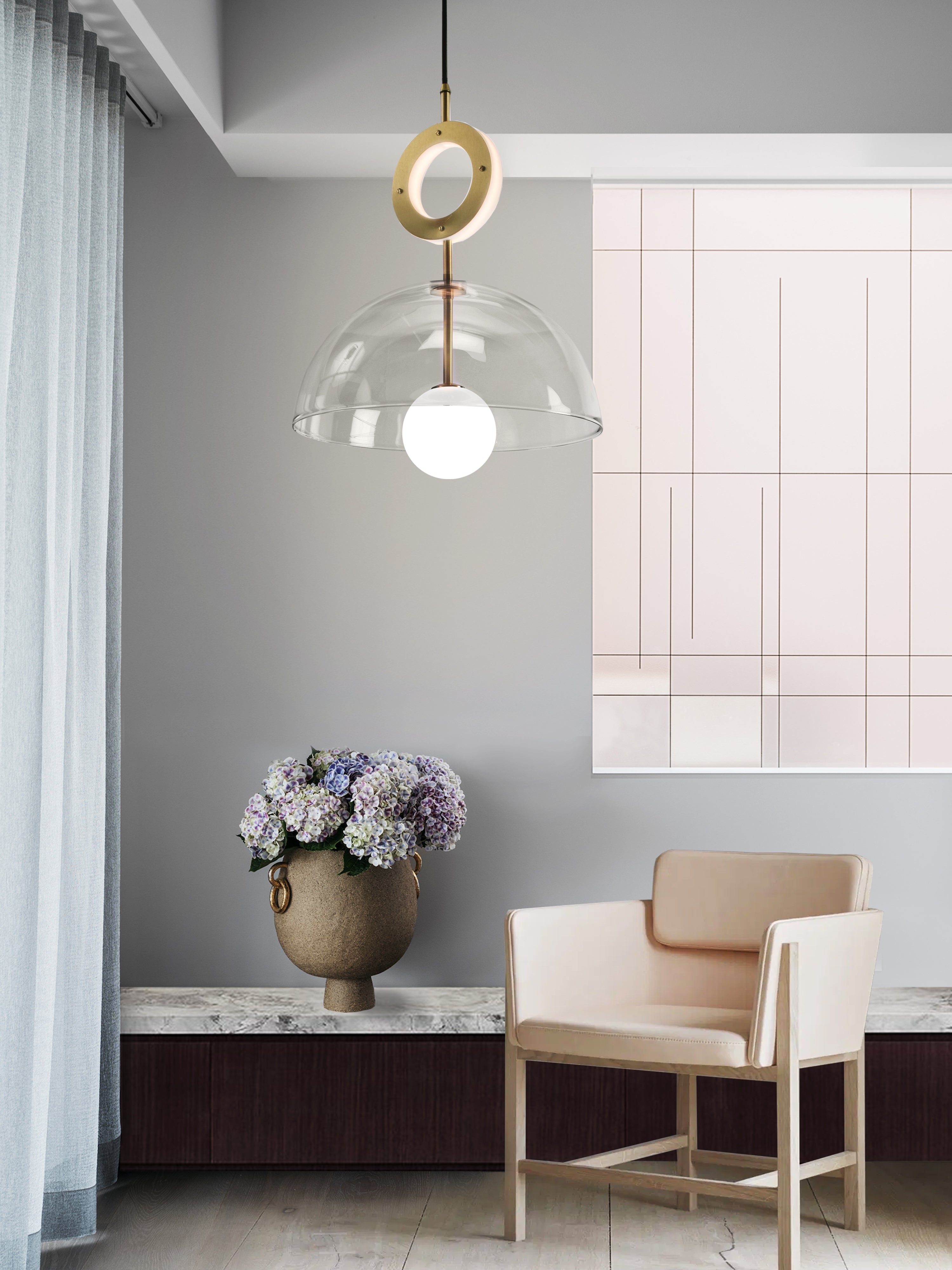 Deco Pendant and Ring Light, clear hanging from ceiling in setting.