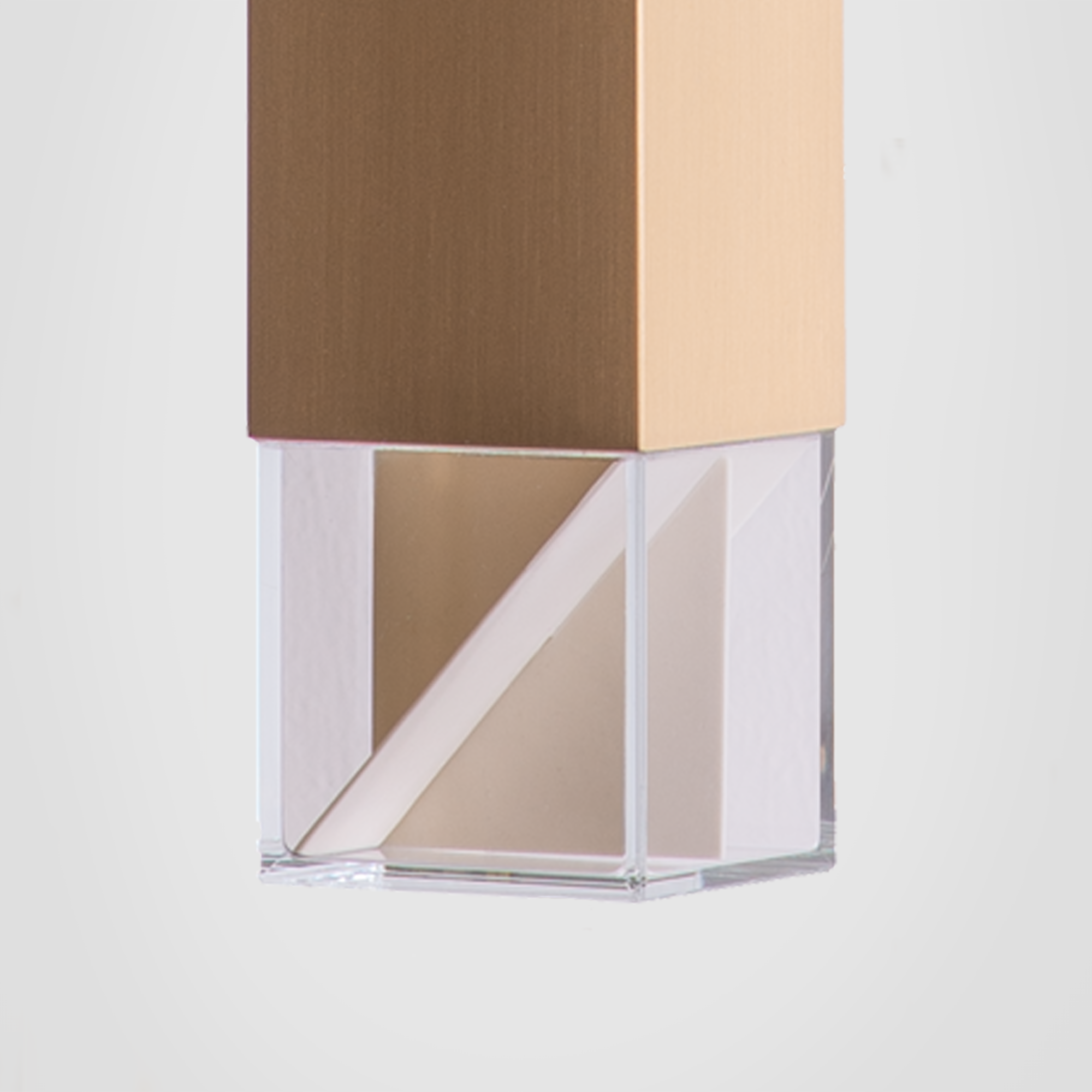 Lamp One Pendant Light / Brass, detailed close up view of glass casing.