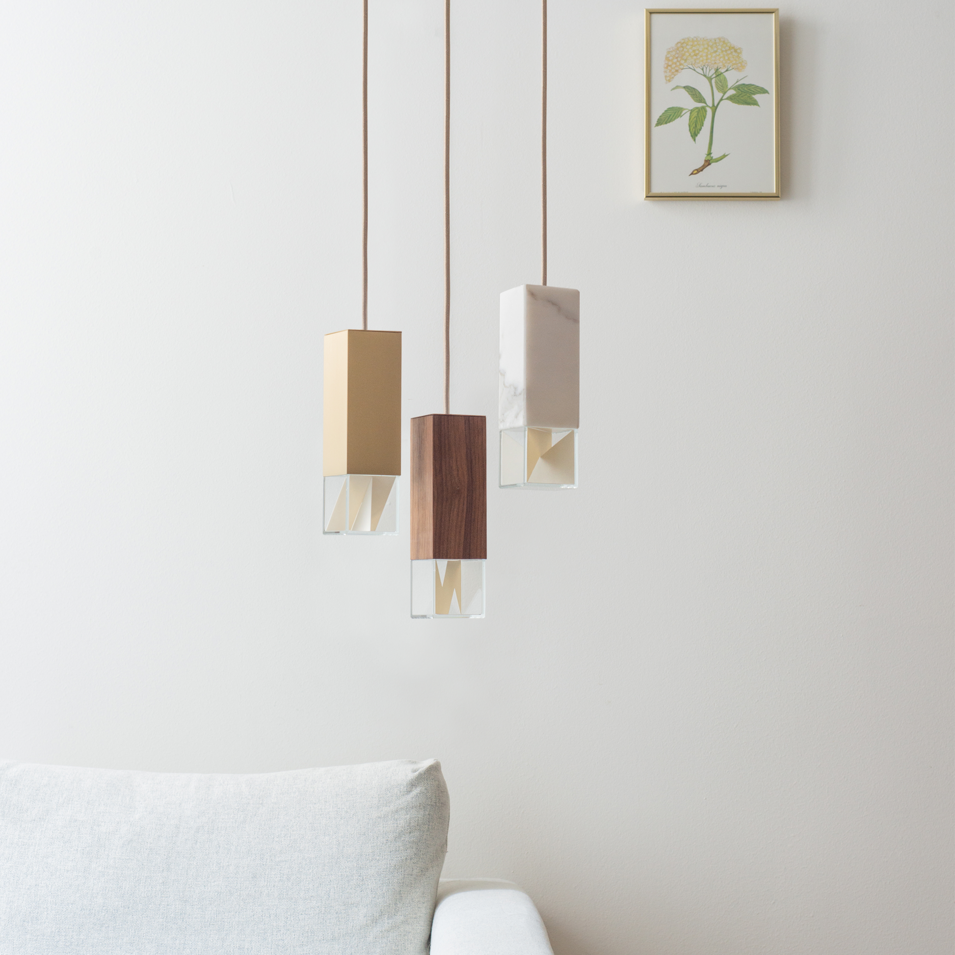 Lamp/ One Collection Chandelier, hanging from ceiling in living room setting.
