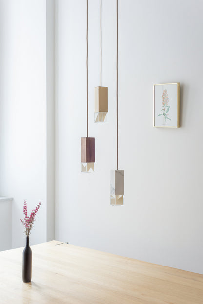 Lamp/ One Collection Chandelier, hanging from ceiling in setting.