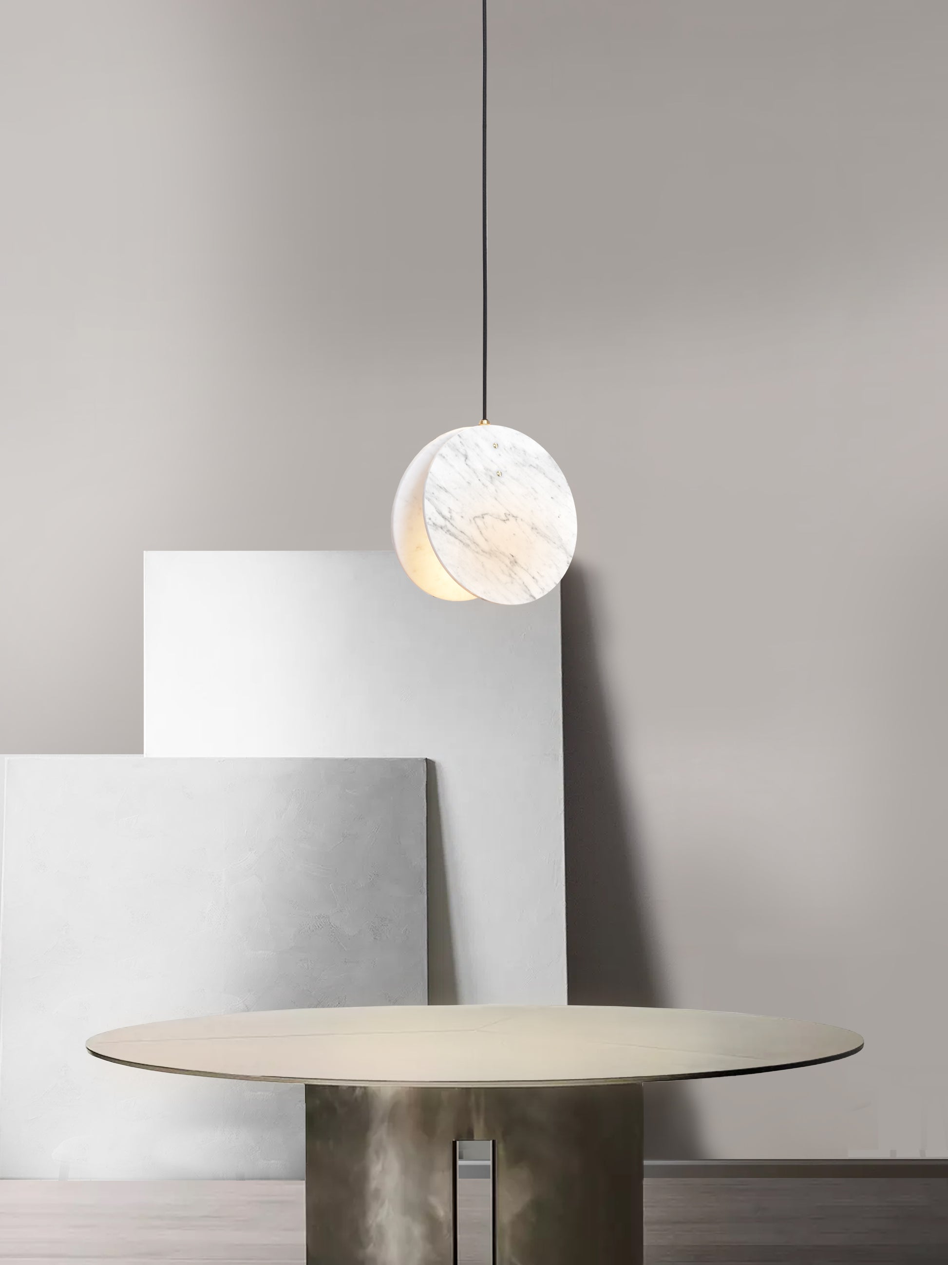 Shell Pendant Light, hanging from ceiling in setting above table.