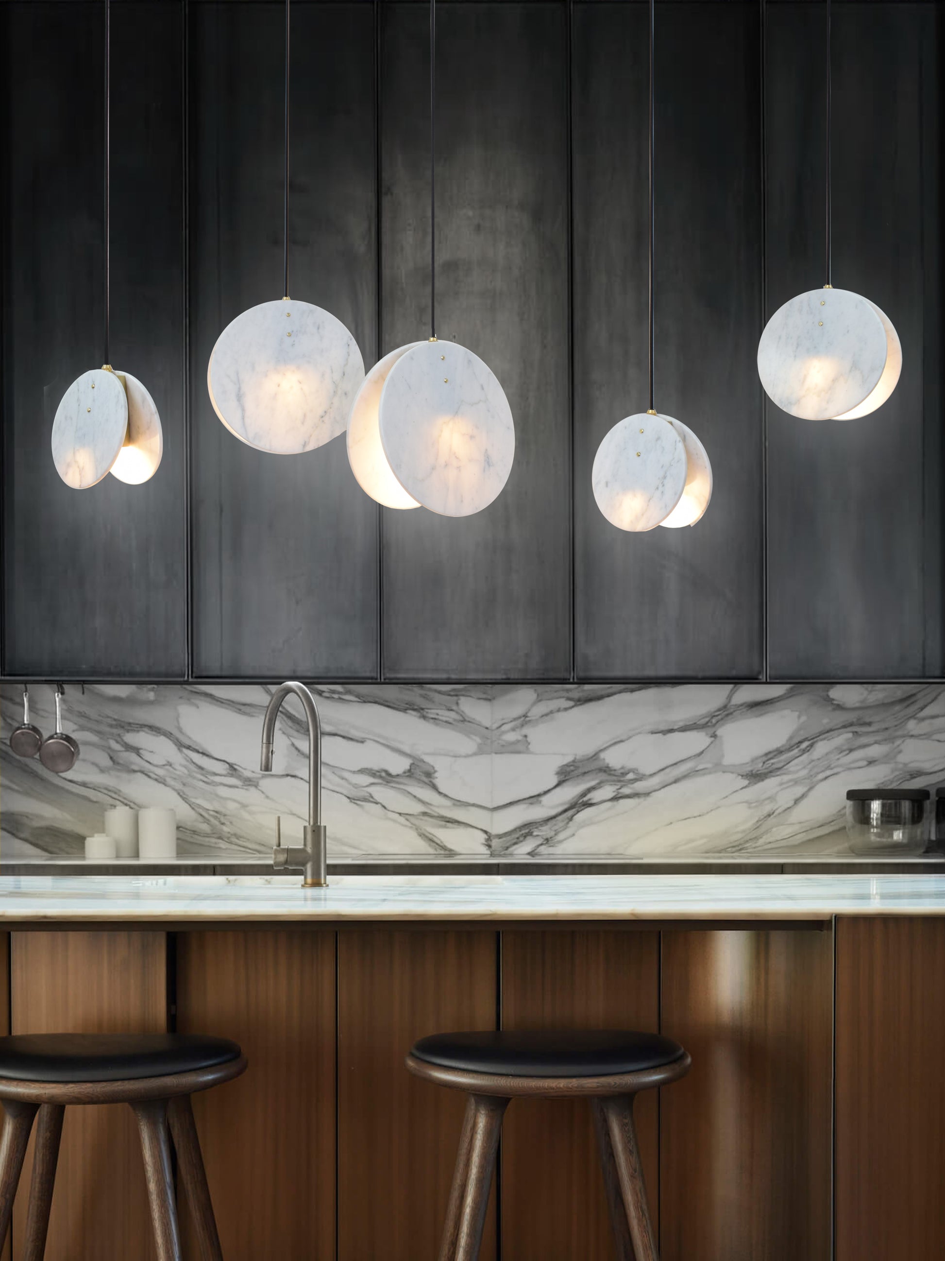 Shell Pendant Light, multiple, hanging from ceiling in setting above kitchen island..