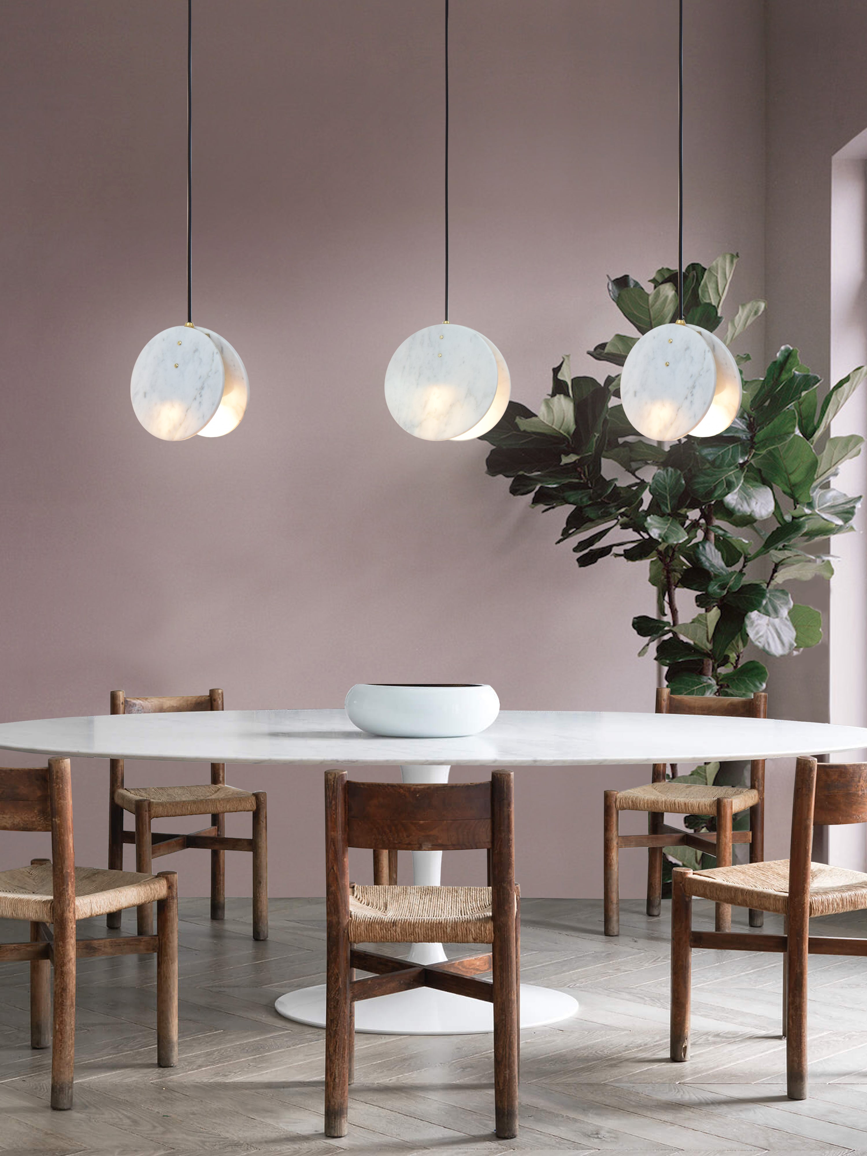 Shell Pendant Light, multiple, hanging from ceiling in setting above table.