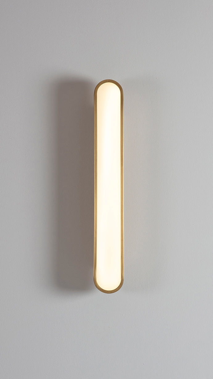 Capsule Wall Light brushed brass, front view on.
