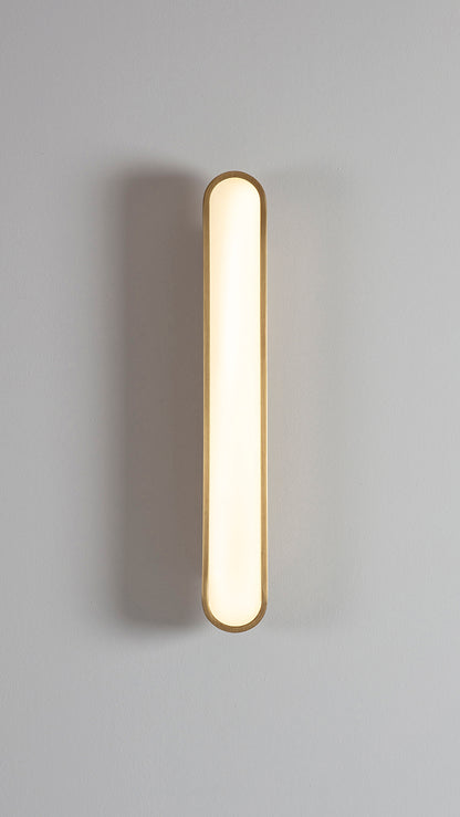 Capsule Wall Light brushed brass, front view on.