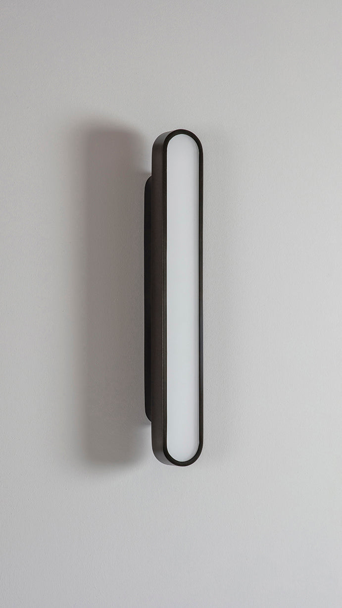 Capsule Wall Light dark bronze, front view.