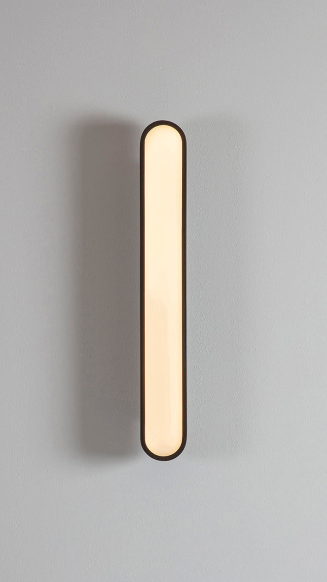 Capsule Wall Light dark bronze, front view on.